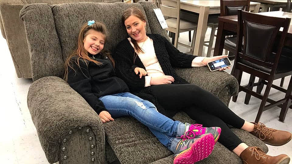 Farrah is registered to the contest to win money with this photo: comfort, couch, fun, furniture, joy, lap, leg, leisure, person, photography, sitting, smile