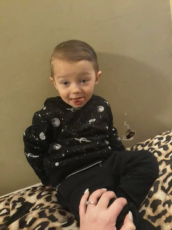 Stephen is registered to the contest to win money with this photo: arm, baby, cheek, child, face, finger, head, leg, person, sitting, skin, smile, toddler