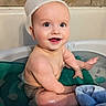Jd is registered to the contest to win money with this photo: baby, bathtub, water, smile, child, playful, washcloth, cap, sitting, skin, cute, happy, bath, indoors, toddler, fun, face, expression, clean, splash
