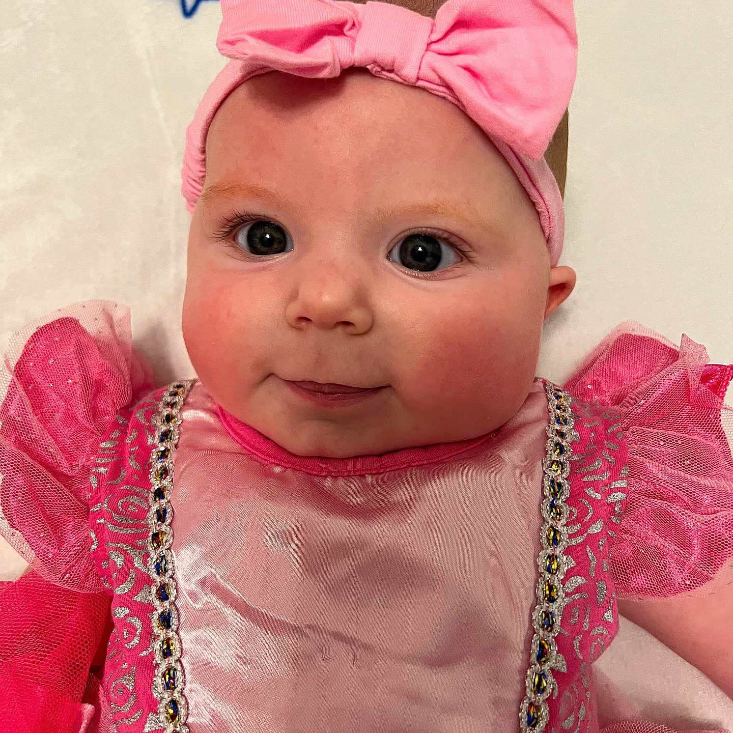 Shelby joined the competition — help win amazing prizes! accessories, baby, bodypart, bonnet, clothing, costume, dress, face, finger, formalwear, hand, hat, head, headband, jewelry, necklace, newborn, person, photography, portrait