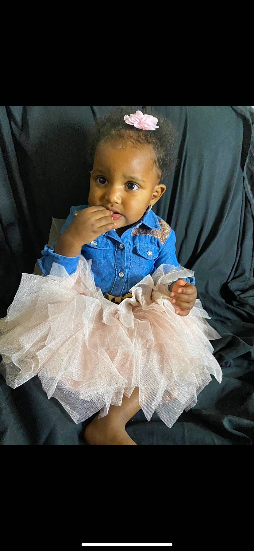 Amara is registered to the contest to win money with this photo: baby, baby_toddler_clothing, ballet_tutu, day_dress, dress, electric_blue, embellishment, eye, face, flash_photography, gesture, hair, happy, head, headgear, headpiece, leg, person, ruffle, sleeve