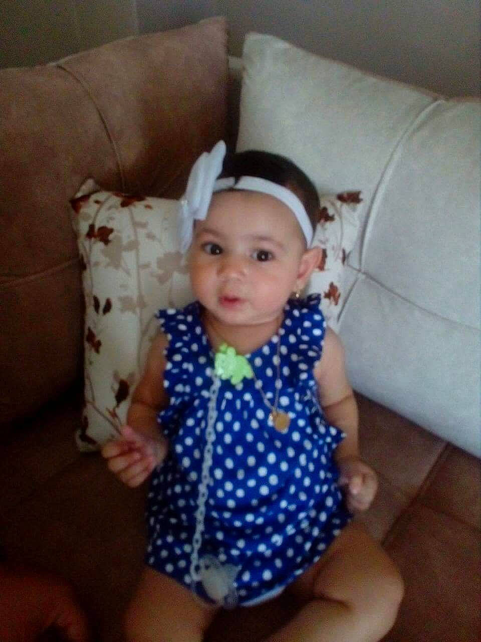 Lycia Maya participe au concours pour gagner de l'argent avec cette photo : baby, baby_toddler_clothing, child, design, ear, face, head, headgear, leg, pattern, person, polka_dot, sitting, skin, sleeve, smile, toddler