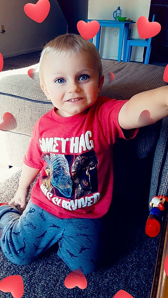 Owen is registered to the contest to win money with this photo: arm, baby, cheek, child, cool, eye, face, hair, hairstyle, happy, head, joy, people, person, pink, play, product, skin, smile, standing