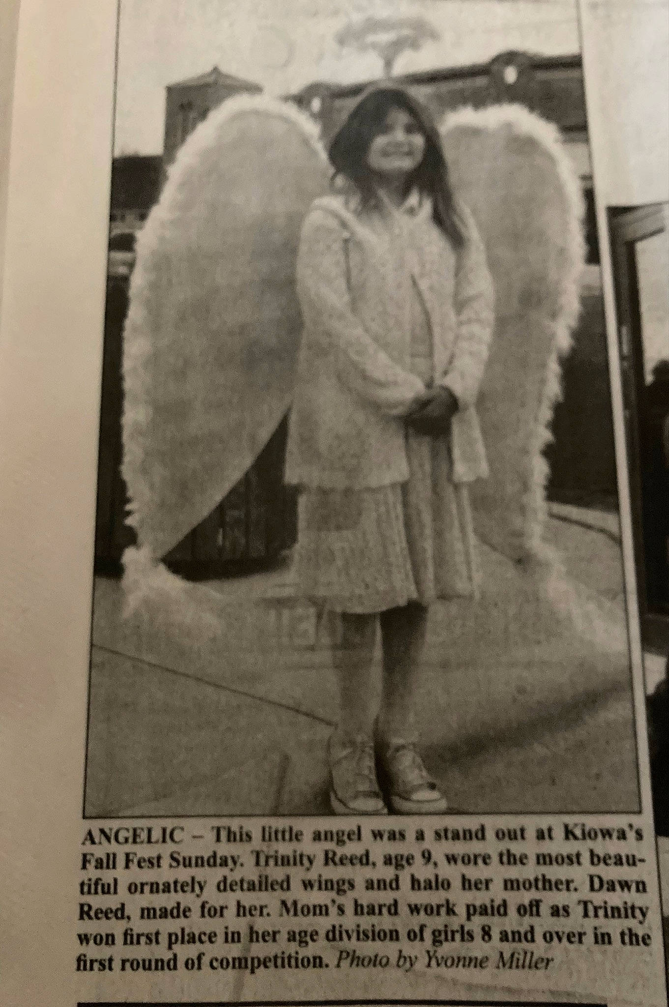 Trinity joined the competition — help win amazing prizes! duster, fur, fur_clothing, human_leg, joy, knee, newspaper, overcoat, paper, paper_product, pattern, person, publication, retro_style, sleeve, trench_coat, uniform, vintage_advertisement, vintage_clothing, visual_arts