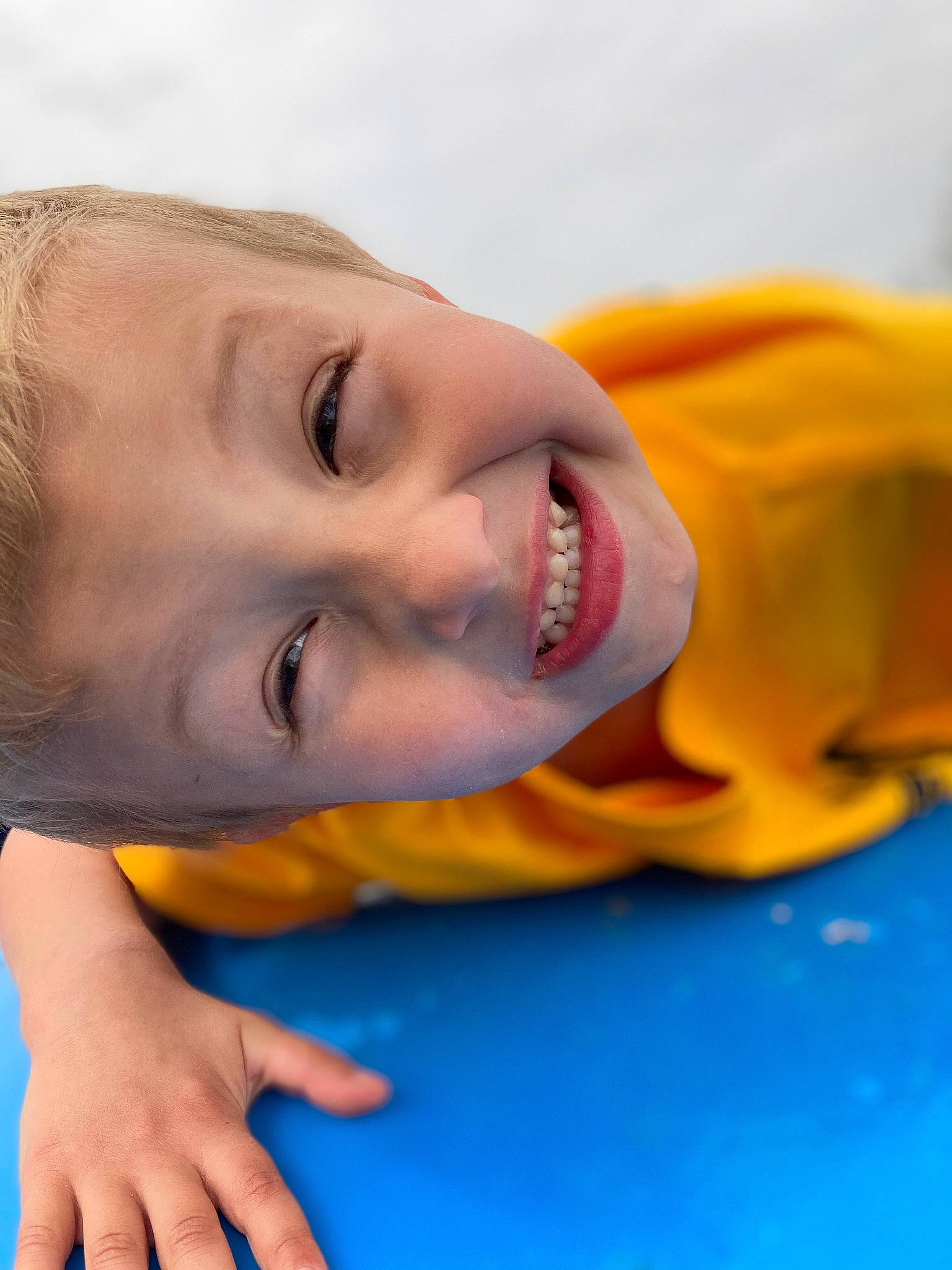 Ezra is registered to the contest to win money with this photo: baby, cheek, child, chin, close_up, electric_blue, eye, eyebrow, face, flooring, fun, happy, head, joy, leisure, lip, mouth, nose, person, skin