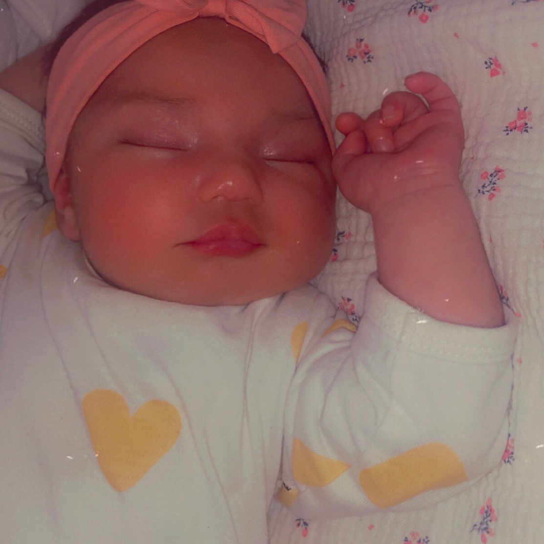 Milla participe au concours pour gagner de l'argent avec cette photo : baby, baby_products, baby_sleeping, baby_toddler_clothing, bedtime, cheek, child, comfort, gesture, happy, linens, lip, mouth, nap, nose, pink, skin, sleeve, textile, toddler