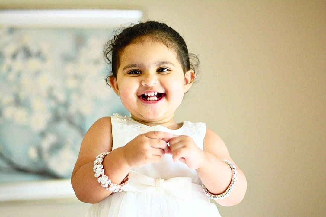 Anayah joined the competition — help win amazing prizes! baby, cheek, child, facial_expression, finger, gesture, hand, happy, joy, nose, person, photograph, photography, pink, portrait, portrait_photography, skin, smile, toddler