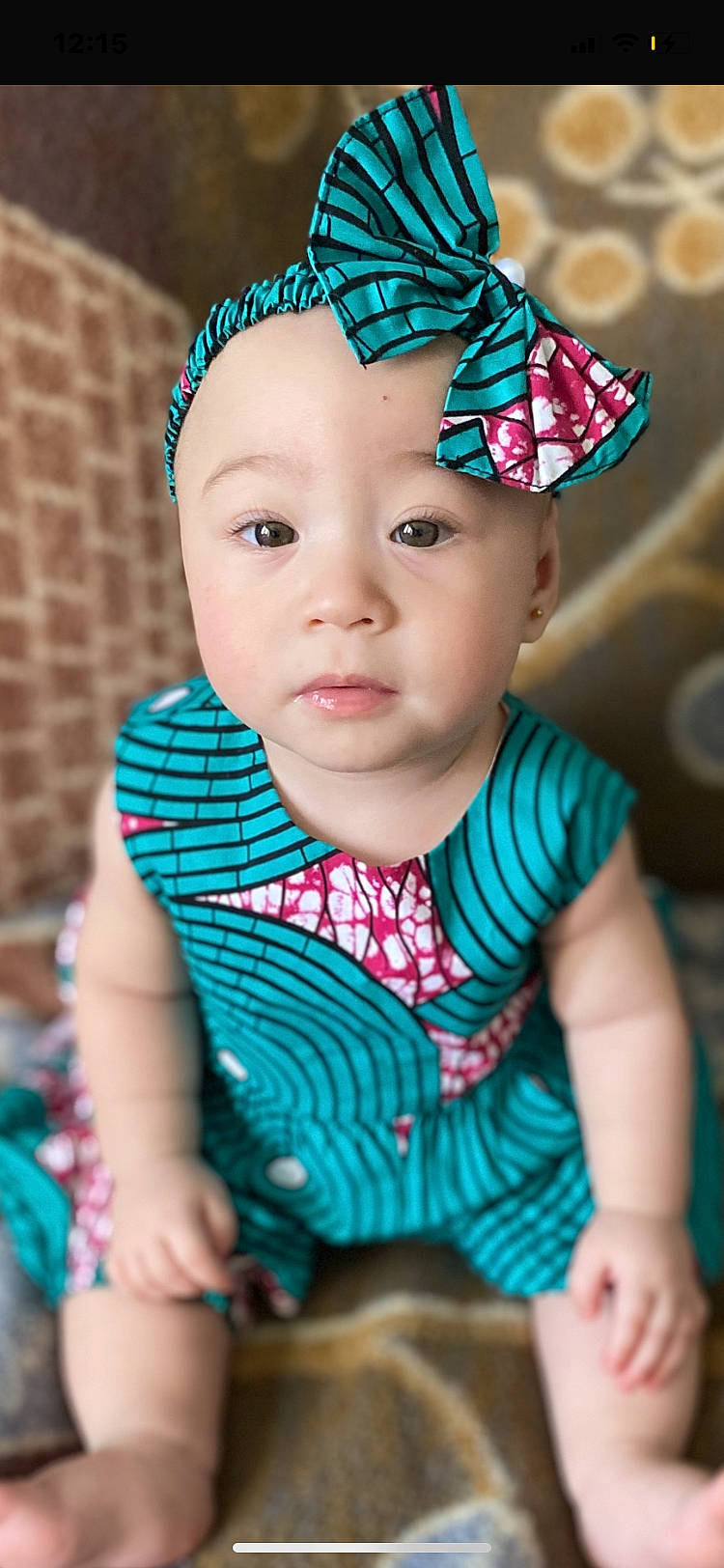 Cattaleya participe au concours pour gagner de l'argent avec cette photo : baby_toddler_clothing, blue, cap, chin, clothing, dress, eye, finger, green, hand, happy, headgear, human_body, lip, neck, person, pink, skin, sleeve, textile