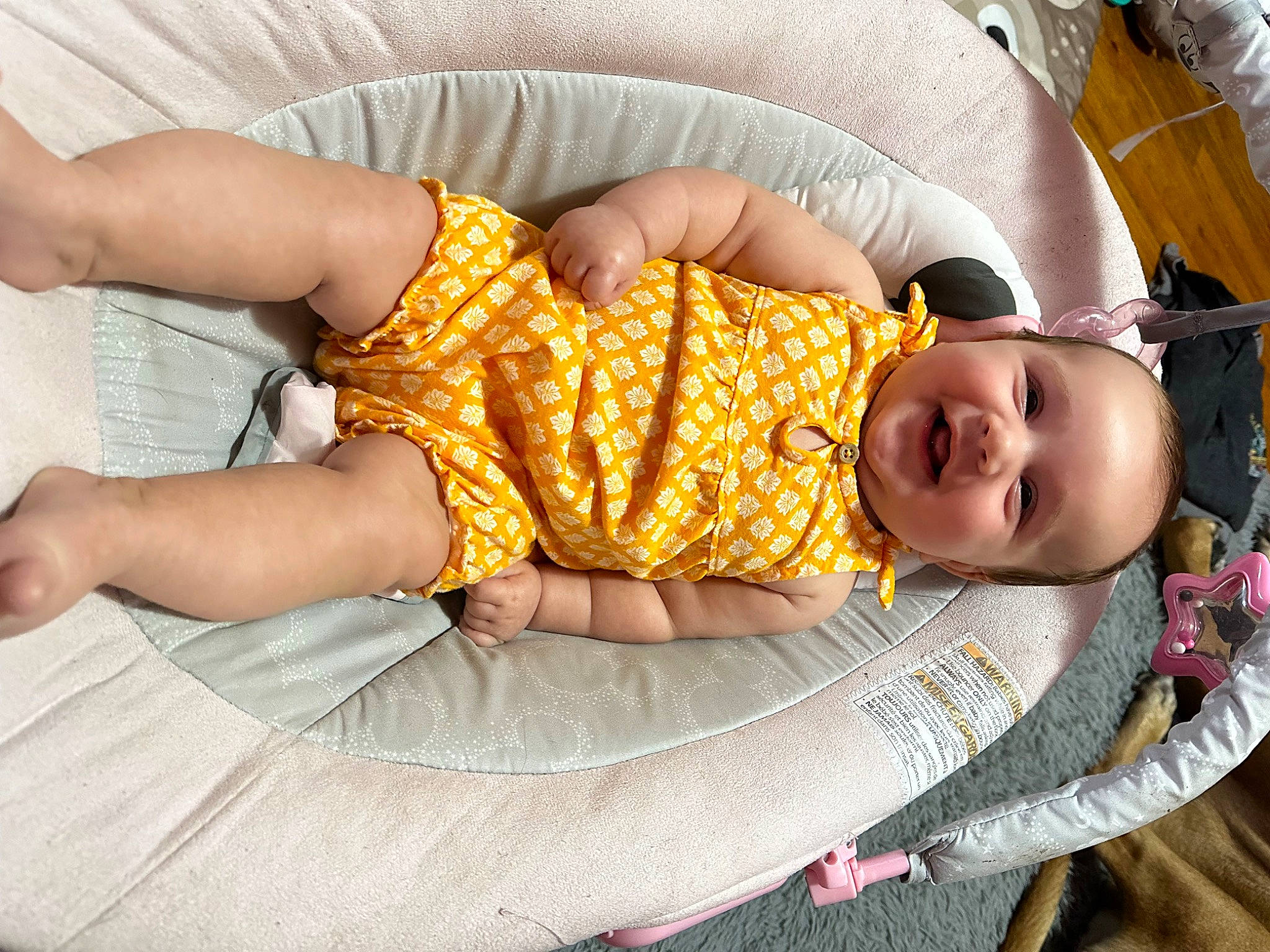 Scarlette is registered to the contest to win money with this photo: abdomen, baby, baby_products, baby_sleeping, baby_toddler_clothing, bed, bedtime, child, comfort, elbow, human_leg, joy, lap, linens, nap, pattern, person, sitting, smile, thigh