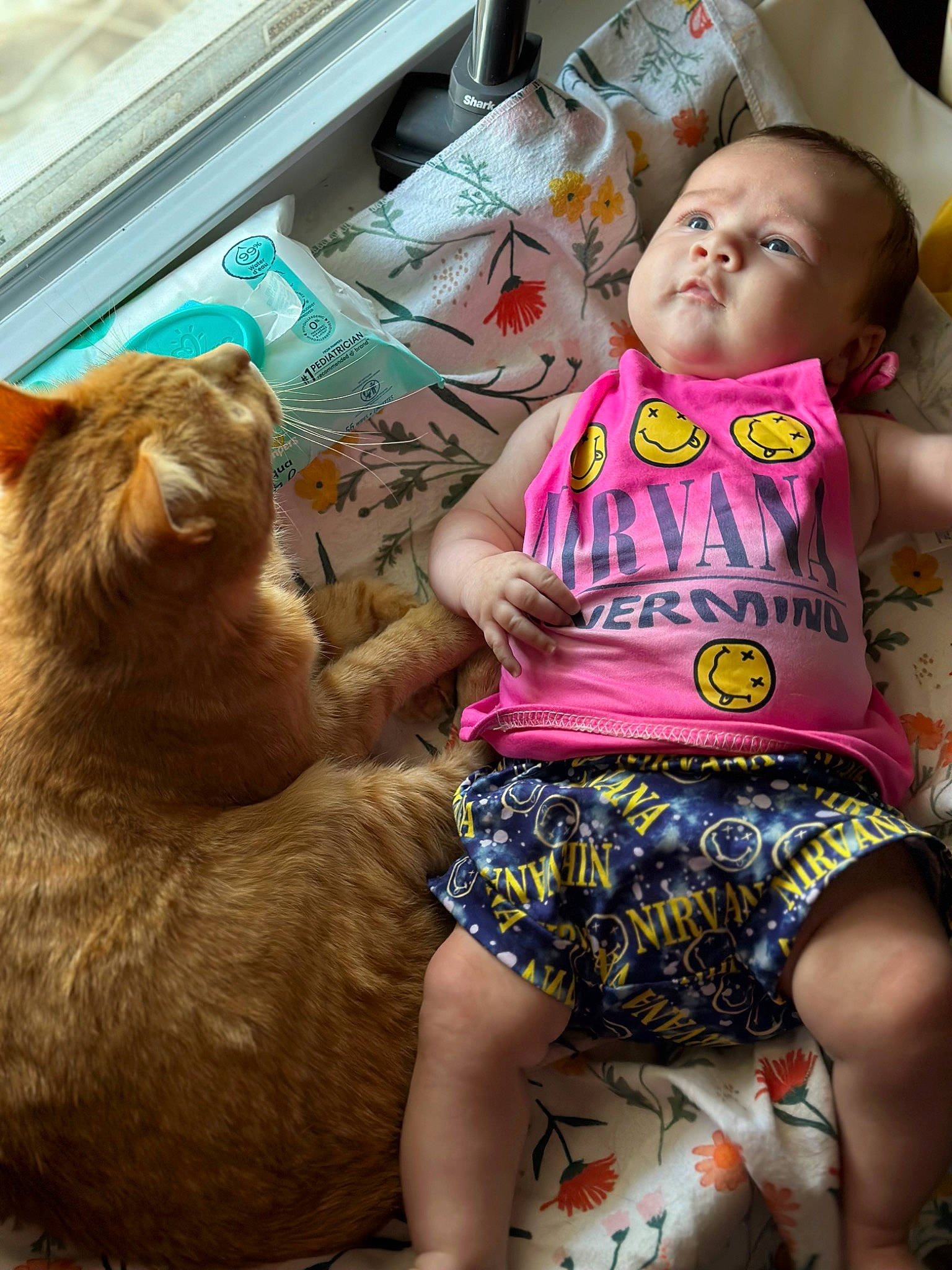 Scarlette is registered to the contest to win money with this photo: abdomen, adaptation, baby, chest, flesh, fun, fur, happy, human_leg, mammal, mouth, person, sitting, skin, t_shirt, terrestrial_animal, textile, thigh, toddler, trunk