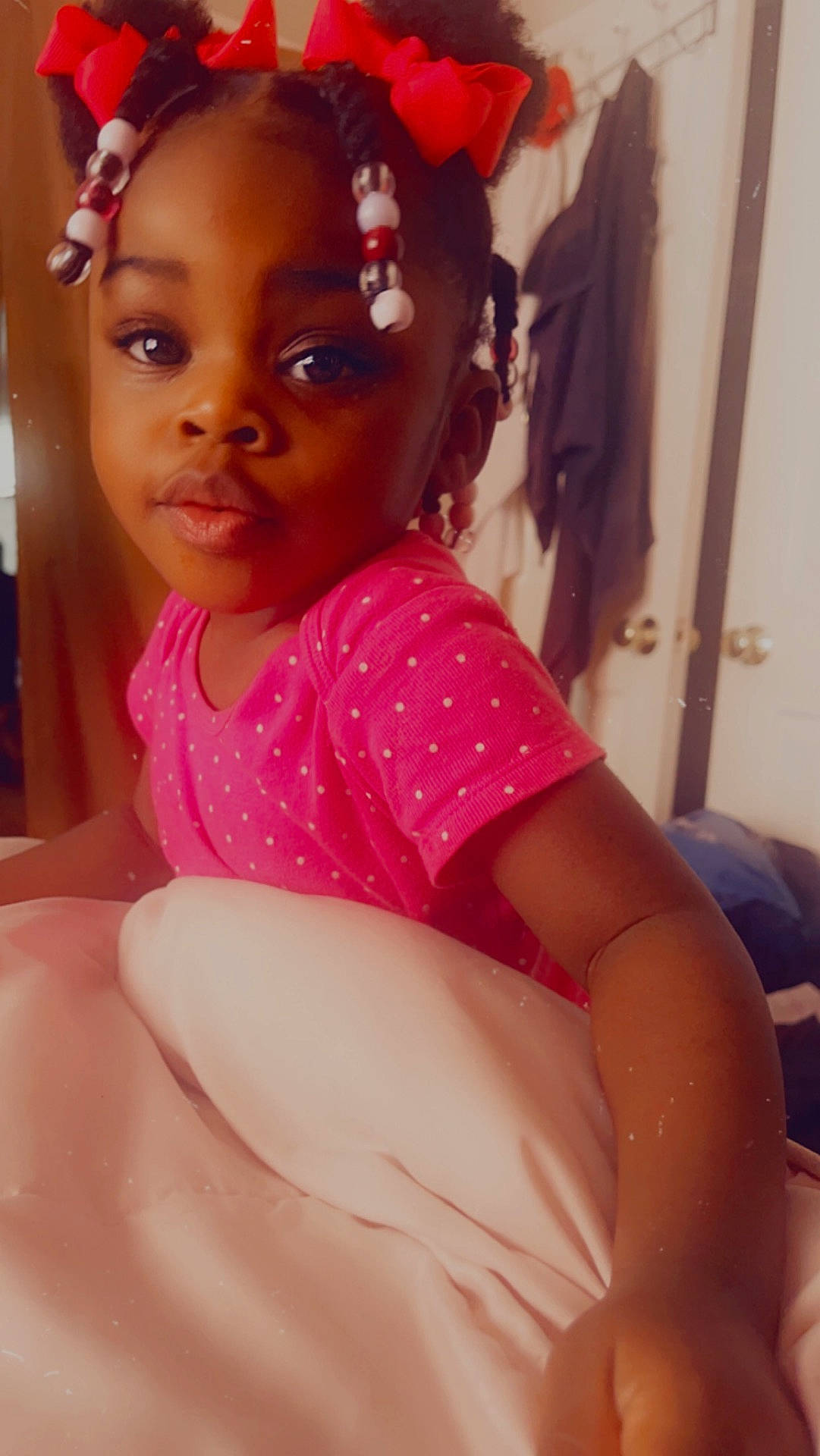 Callie is registered to the contest to win money with this photo: accessories, bodypart, child, clothing, dress, eveningdress, face, female, finger, formalwear, girl, hand, happy, head, indoors, person, photography, portrait, sitting, smile