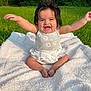Sol joined the competition — help win amazing prizes! arms_outstretched, baby, blanket, child, cute, dressed, face, grass, greenery, happy, infant, joy, nature, outdoors, person, playful, sitting, smiling, summer, sunlight