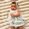 Miyori joined the competition — help win amazing prizes! baby, infant, child, smiling, cute, headband, dress, striped_clothing, white_shoes, plush_blanket, soft_texture, laying_down, happy, tongue_out, indoors, portrait, person, skin, hand, footwear