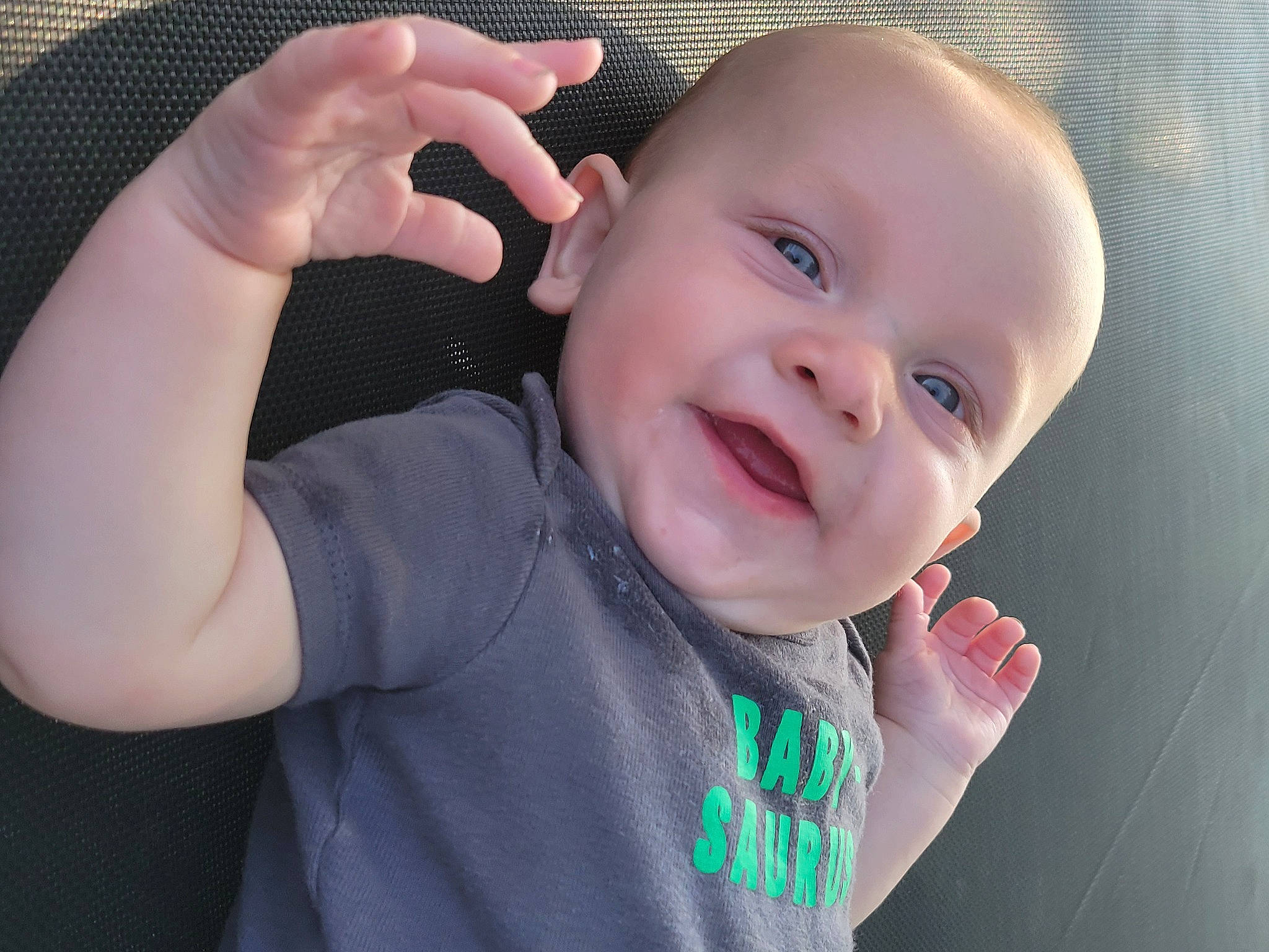 Kaiser is registered to the contest to win money with this photo: baby, baby_toddler_clothing, cheek, ear, eyebrow, eyelash, finger, gesture, hand, happy, iris, jaw, lip, mouth, nose, person, skin, sleeve, smile, tongue