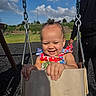 toddler, child, swing, playground, smiling, happy, outdoor, daylight, sky, clouds, grass, adult, person, fun, joy, colorful, dress, metal_chain, hand, park
