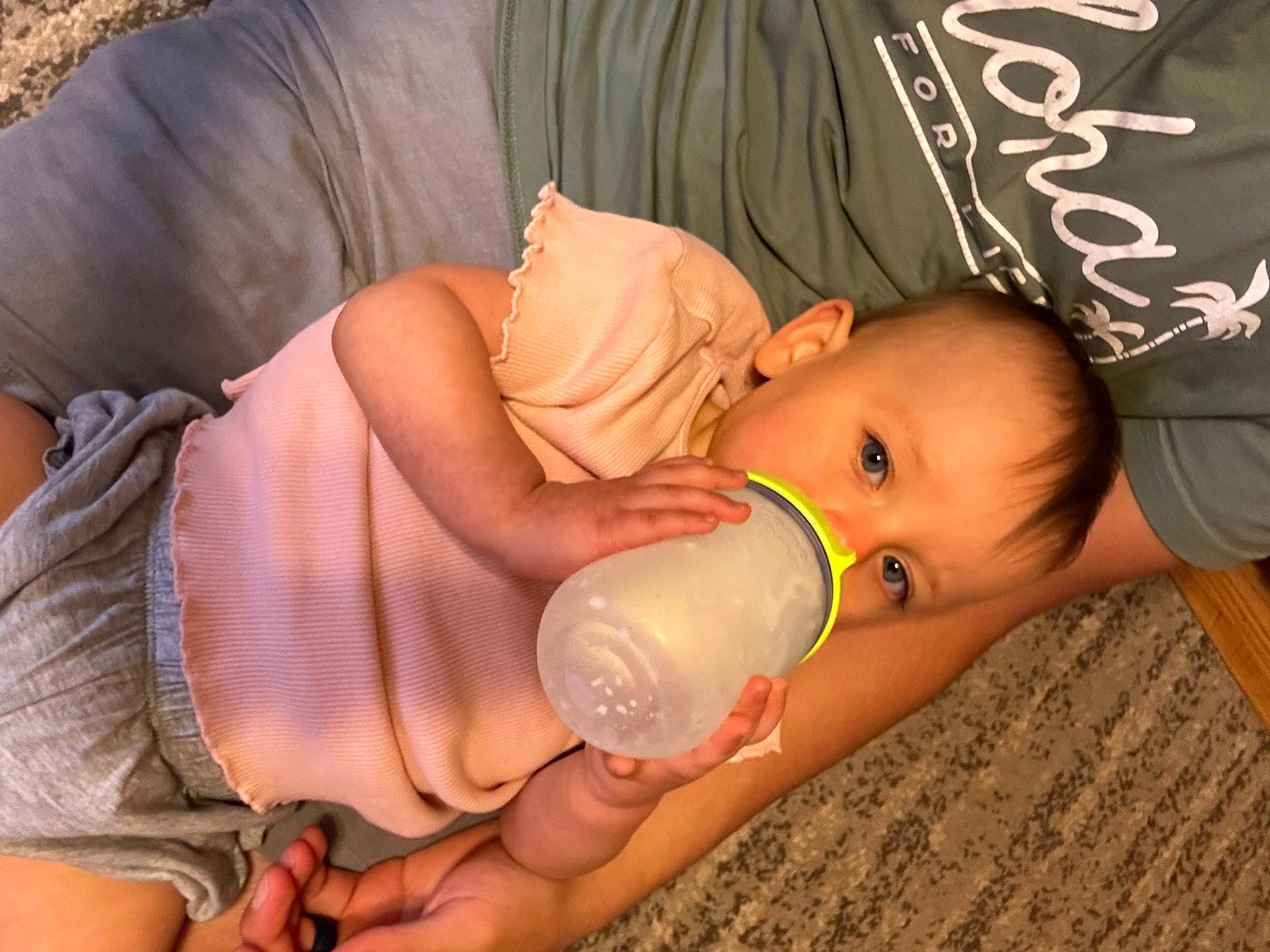 Wynter is registered to the contest to win money with this photo: baby, baby_bottle, baby_products, baby_toddler_clothing, bottle, cheek, child, comfort, drinking, drinkware, finger, fun, infant_formula, milk, mouth, nail, person, plant_milk, plastic_bottle, skin