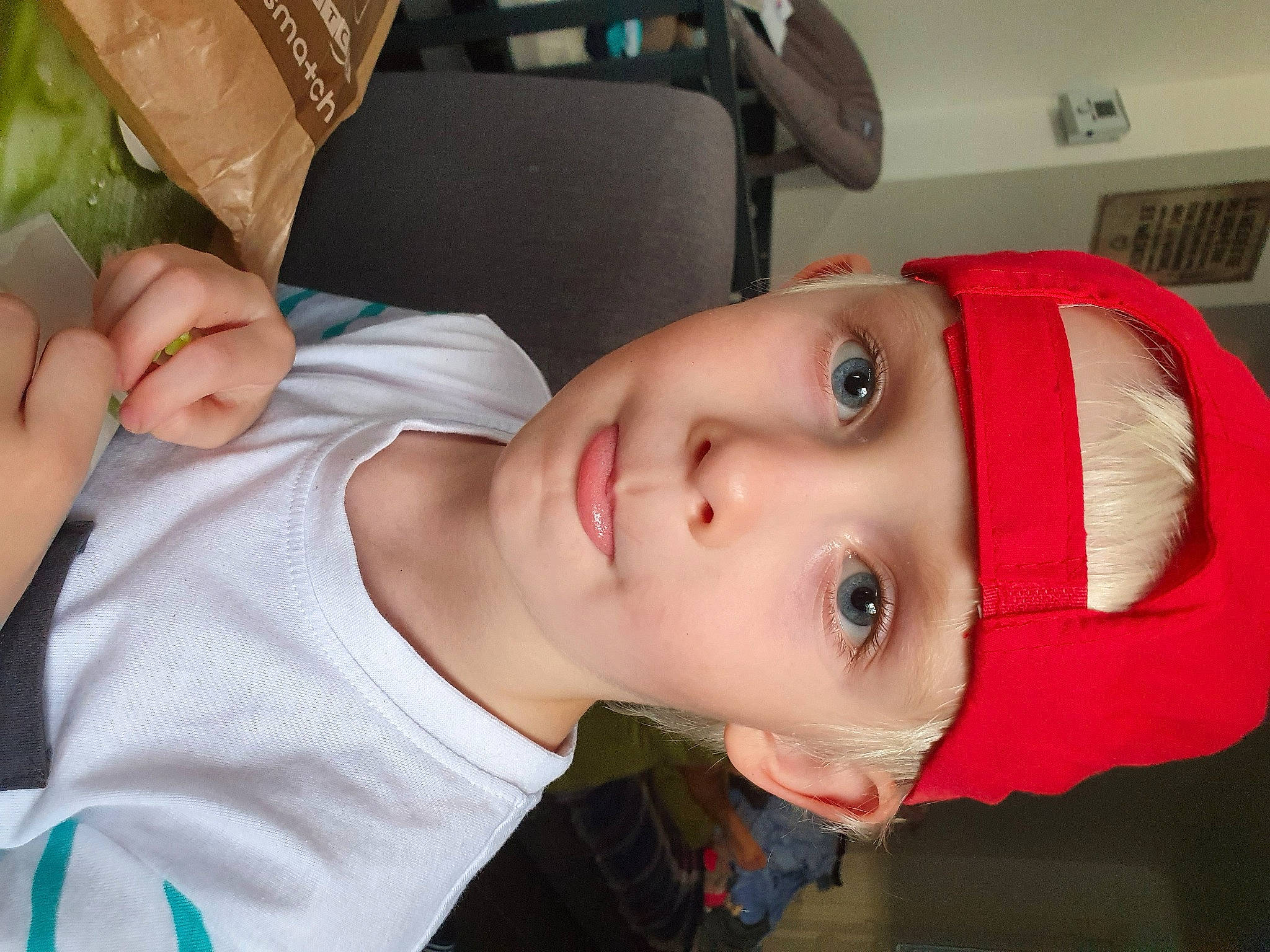 Ethan participe au concours pour gagner de l'argent avec cette photo : baby, baby_toddler_clothing, carmine, cheek, chin, cool, eyelash, headwear, jaw, leaf_vegetable, person, produce, throat, toddler, vegetable