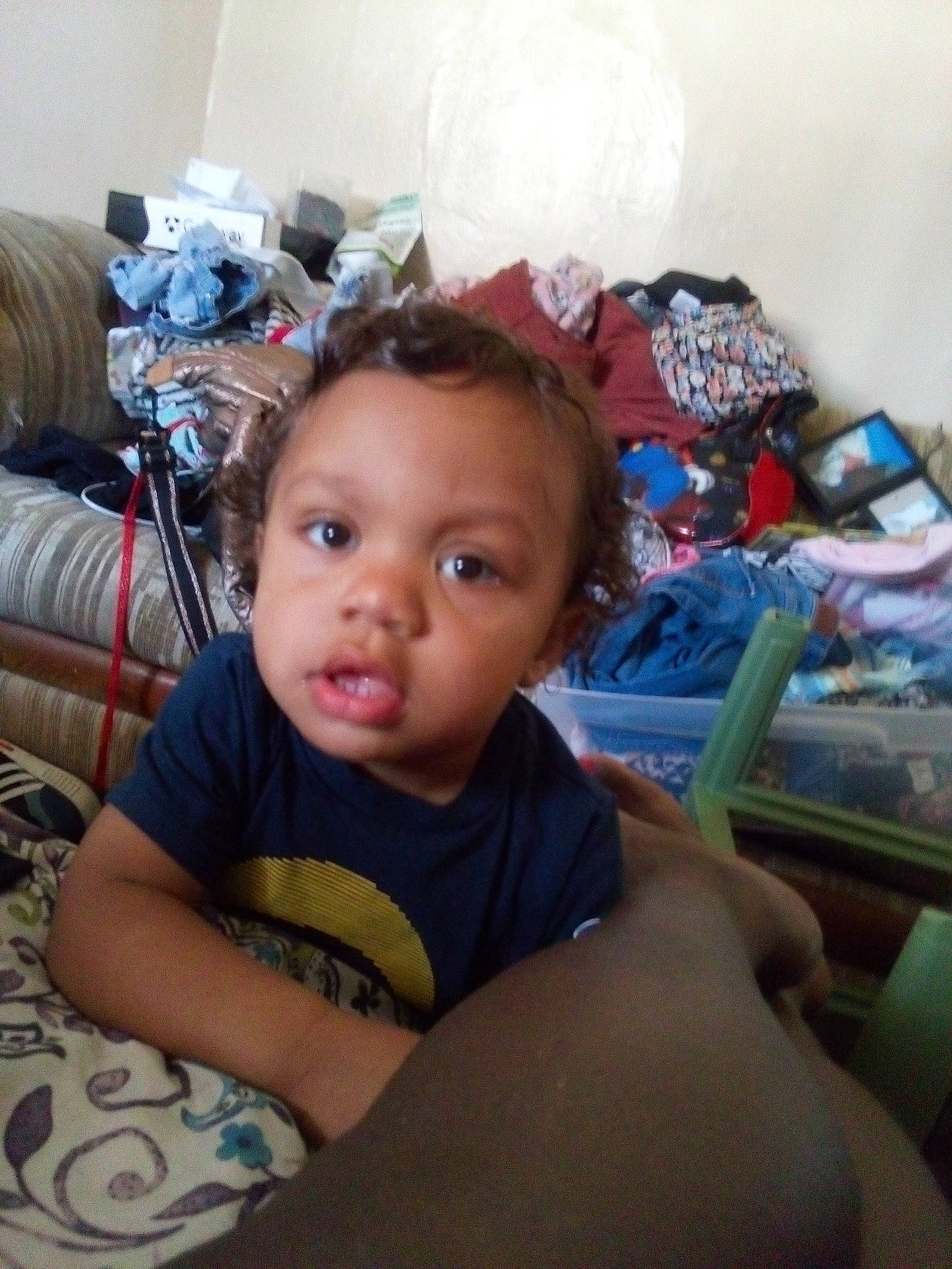 Djkai is registered to the contest to win money with this photo: abdomen, baby, baby_toddler_clothing, cheek, chest, child, comfort, flooring, fun, human_leg, lap, leisure, linens, person, room, sitting, t_shirt, thigh, toddler, trunk