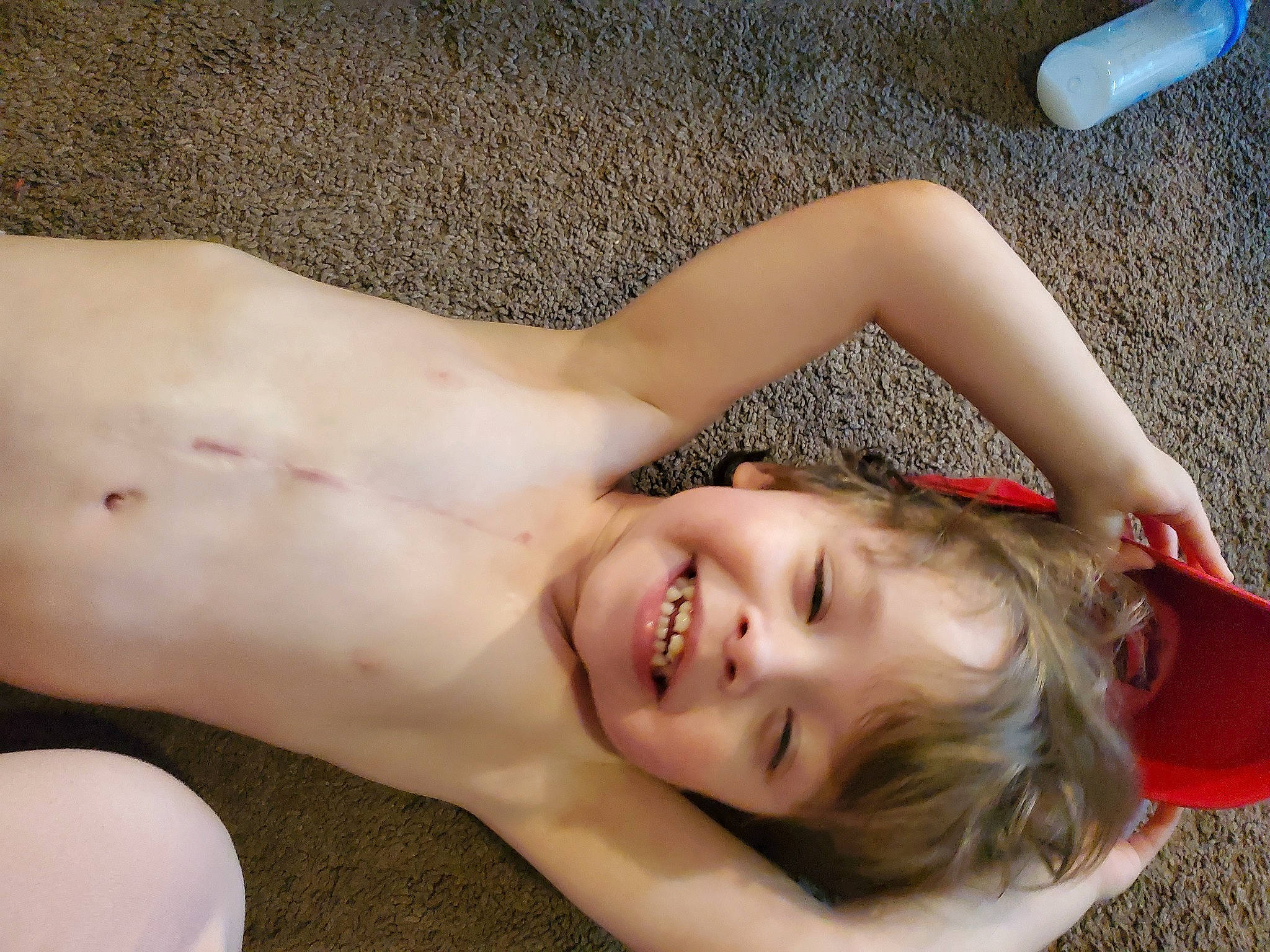 Wayne is registered to the contest to win money with this photo: abdomen, blond, chest, elbow, eyelash, flash_photography, gesture, grass, happy, human_leg, jaw, joint, joy, lip, mouth, muscle, neck, people_in_nature, person, smile