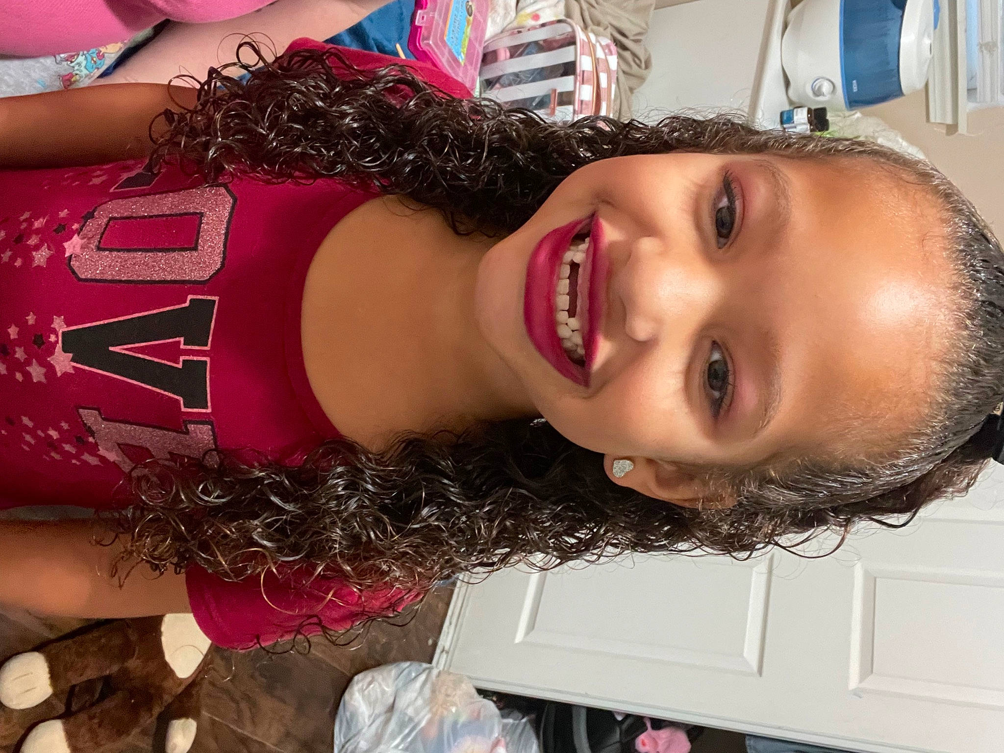 Aaliyah is registered to the contest to win money with this photo: black_hair, cheek, chest, eyebrow, eyelash, happy, human_leg, jaw, joy, lip, lipstick, magenta, mouth, nose, person, pink, selfie, skin, smile, trunk