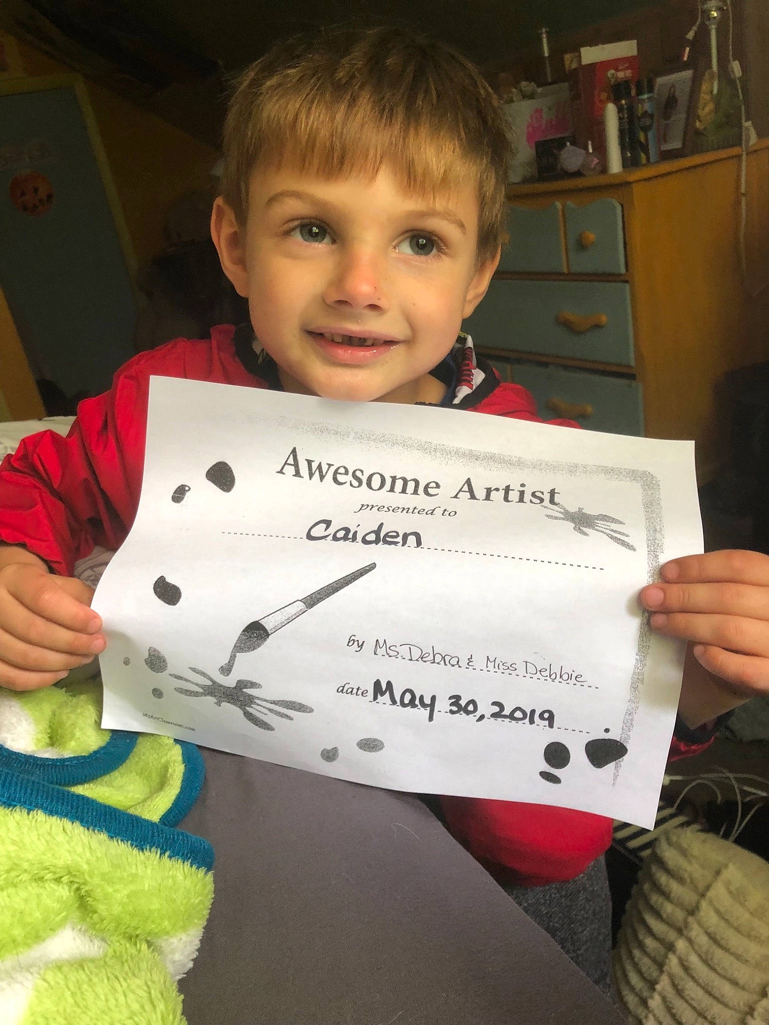 Caiden is registered to the contest to win money with this photo: child, joy, person, reading