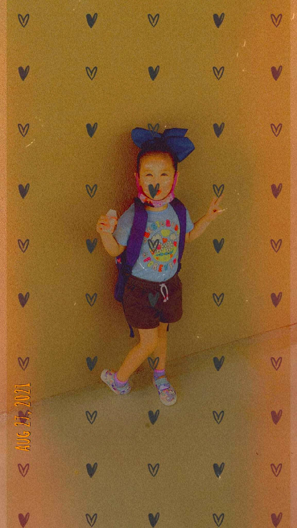 Allison is registered to the contest to win money with this photo: art, child, climbing, climbing_hold, electric_blue, fun, happy, leisure, magenta, paint, pattern, people_in_nature, person, pink, play, recreation, shorts, sleeve, t_shirt, textile