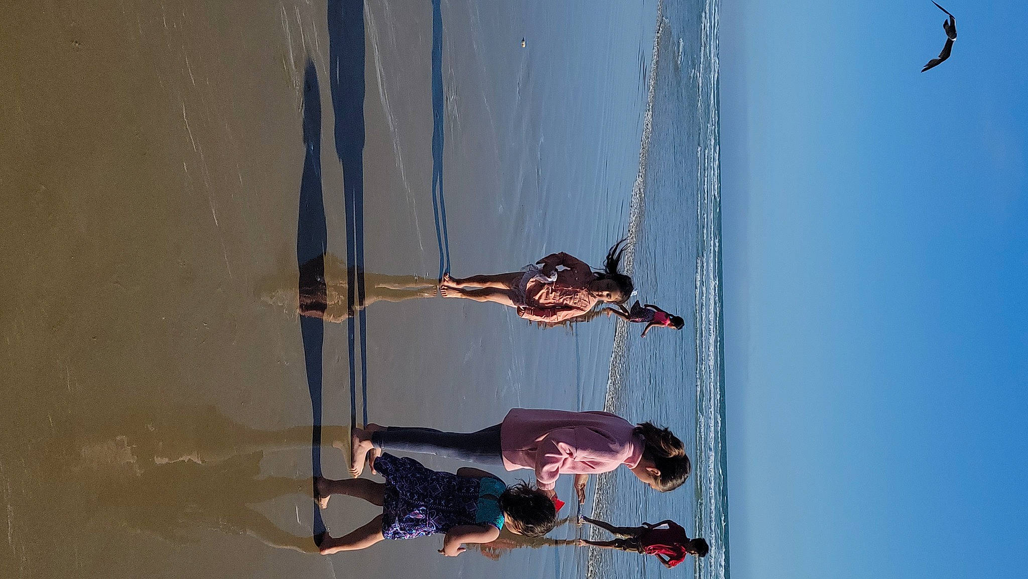 Allison joined the competition — help win amazing prizes! adventure, elbow, fun, hair, hand, head, human_body, lake, leg, leisure, line, person, recreation, reflection, shadow, sky, sports, tree, water, wood