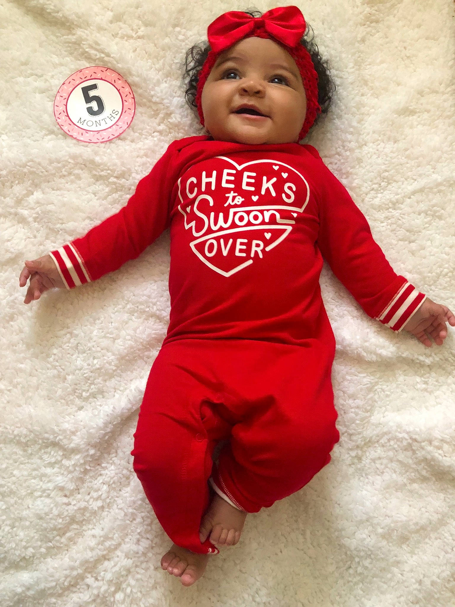 Palmer joined the competition — help win amazing prizes! baby, baby_products, baby_toddler_clothing, child, fictional_character, outerwear, pajamas, person, product, red, sleeve, toddler