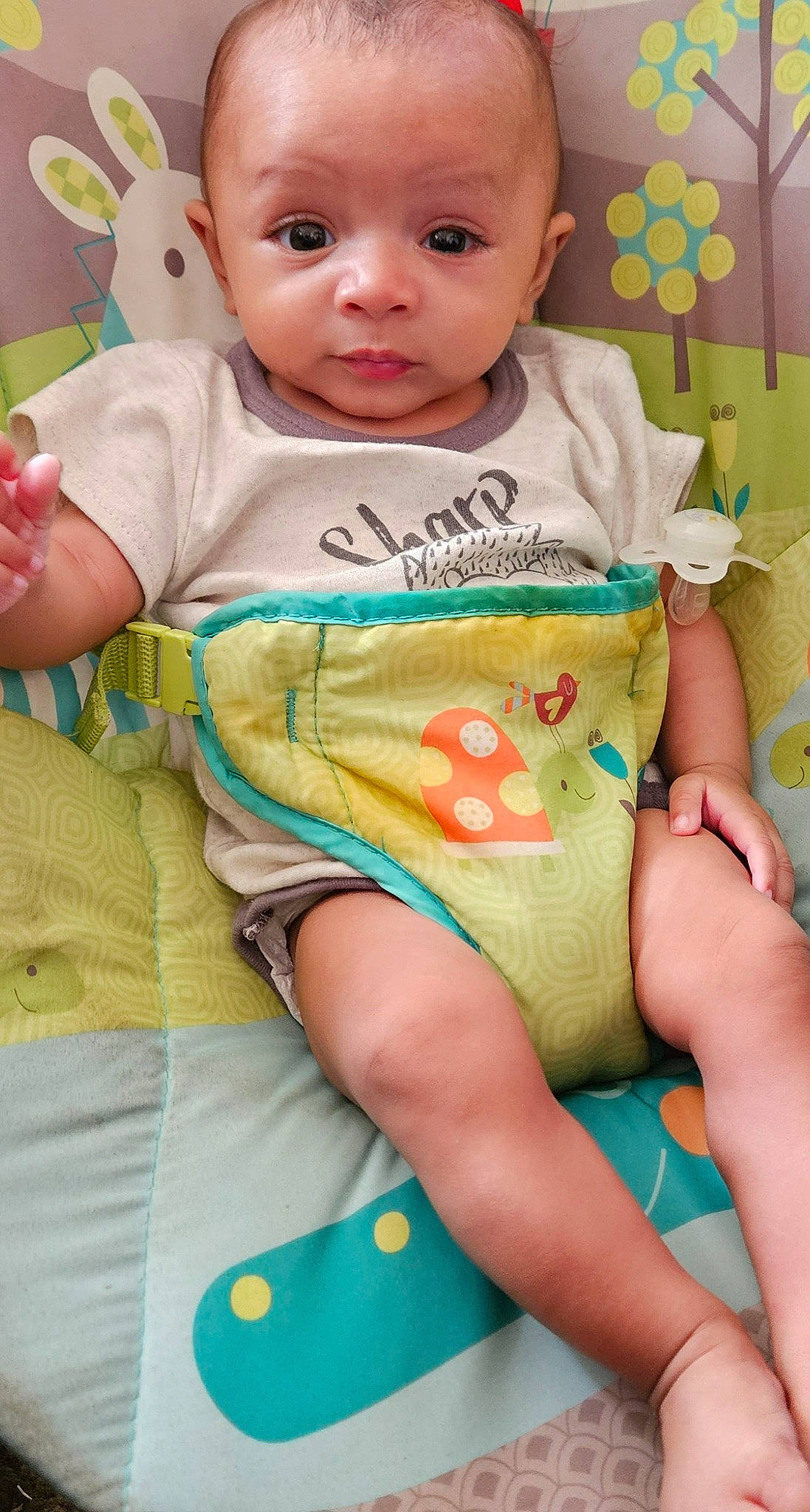 Jayshon is registered to the contest to win money with this photo: baby, baby_toddler_clothing, cheek, child, comfort, eye, face, finger, green, happy, head, mouth, neck, organ, pattern, person, pink, skin, sleeve, thigh