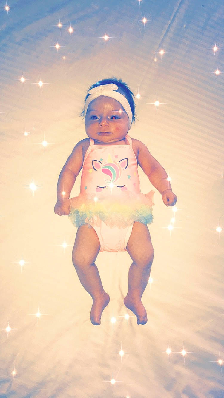 Calia Rose is registered to the contest to win money with this photo: baby, bathing, child, fun, happy, person, photography, skin, sky, smile, toddler, vacation