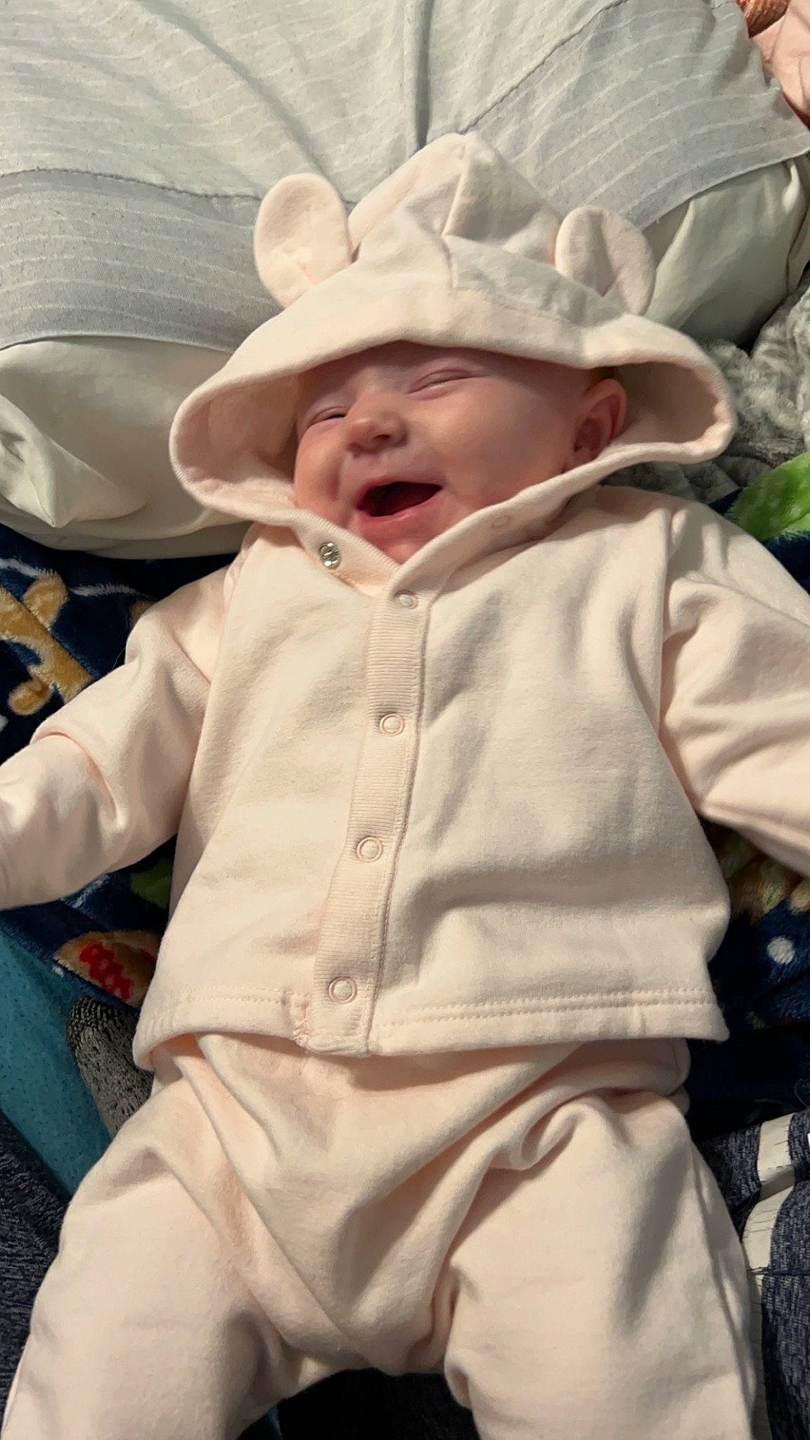 Emberlynn is registered to the contest to win money with this photo: baby, baby_products, baby_toddler_clothing, cheek, child, comfort, face, fun, fur, grass, happy, head, headwear, linens, person, photograph, sitting, skin, sleeve, smile