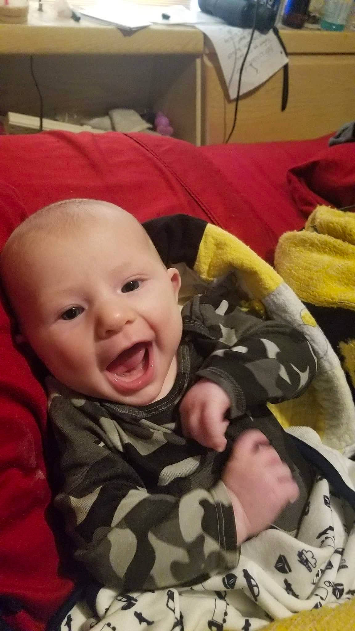 Russell is registered to the contest to win money with this photo: baby, bedtime, cheek, child, facial_expression, mouth, nose, person, skin, smile, toddler