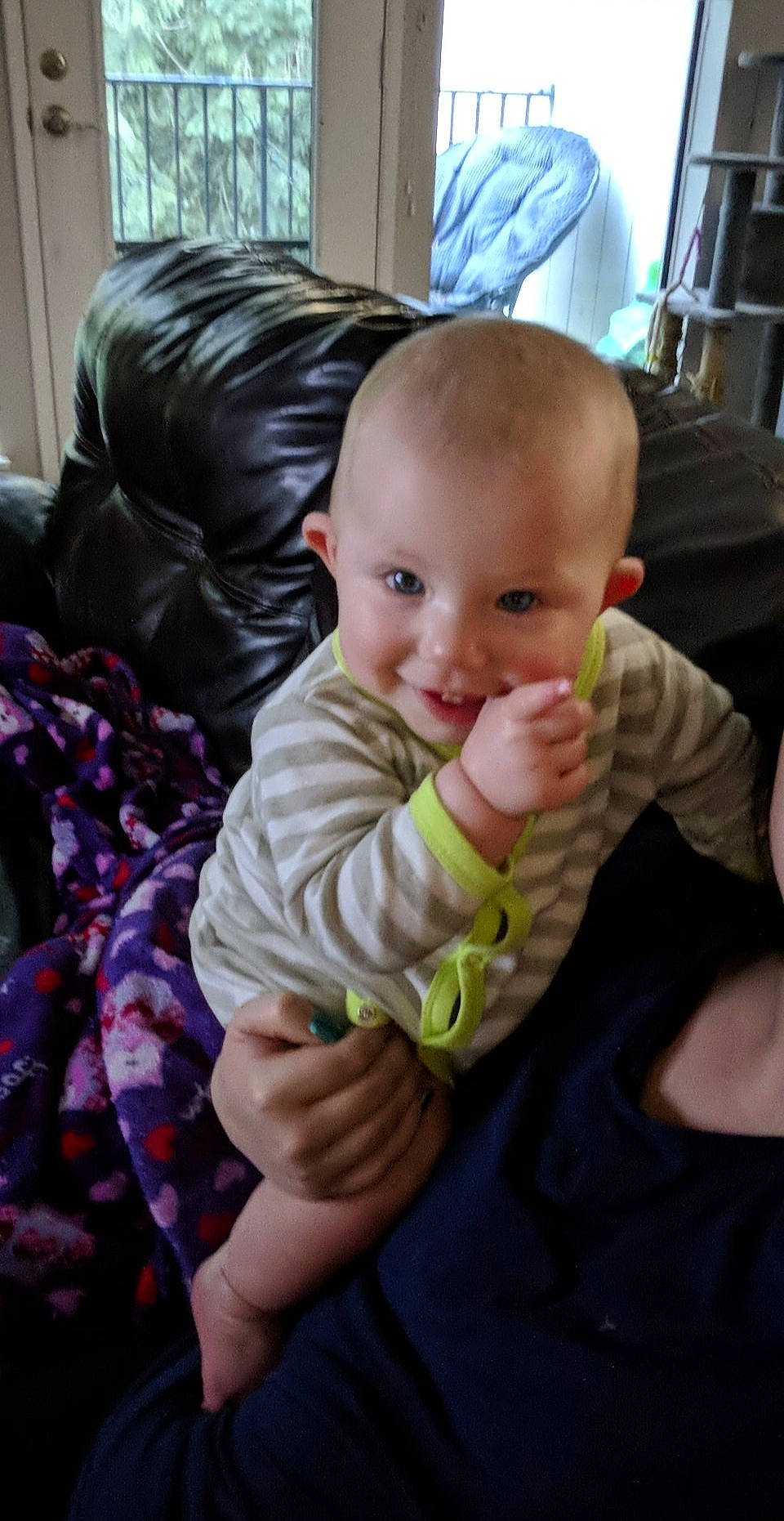 Russell is registered to the contest to win money with this photo: baby, cheek, child, ear, eye, face, finger, head, iris, joy, mouth, nose, organ, person, play, sitting, skin, smile, thumb, toddler