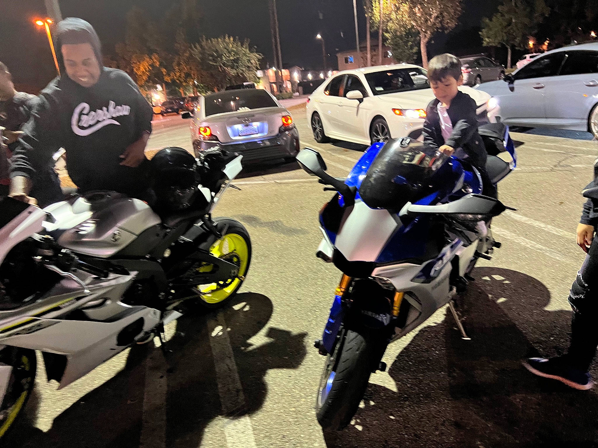 Julius is registered to the contest to win money with this photo: automotive_design, automotive_exterior, automotive_lighting, automotive_tire, automotive_wheel_system, car, fender, headlamp, joy, land_vehicle, motor_vehicle, motorcycle, motorcycle_accessories, motorcycle_fairing, motorcycle_helmet, motorcycling, parking, person, personal_protective_equipment, tire