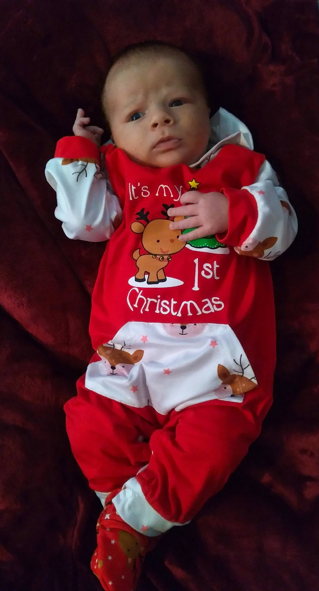 Robert is registered to the contest to win money with this photo: baby, baby_products, baby_toddler_clothing, carmine, cheek, child, chin, collar, event, gesture, happy, head, lip, nail, peach, person, sitting, sleeve, t_shirt, thumb