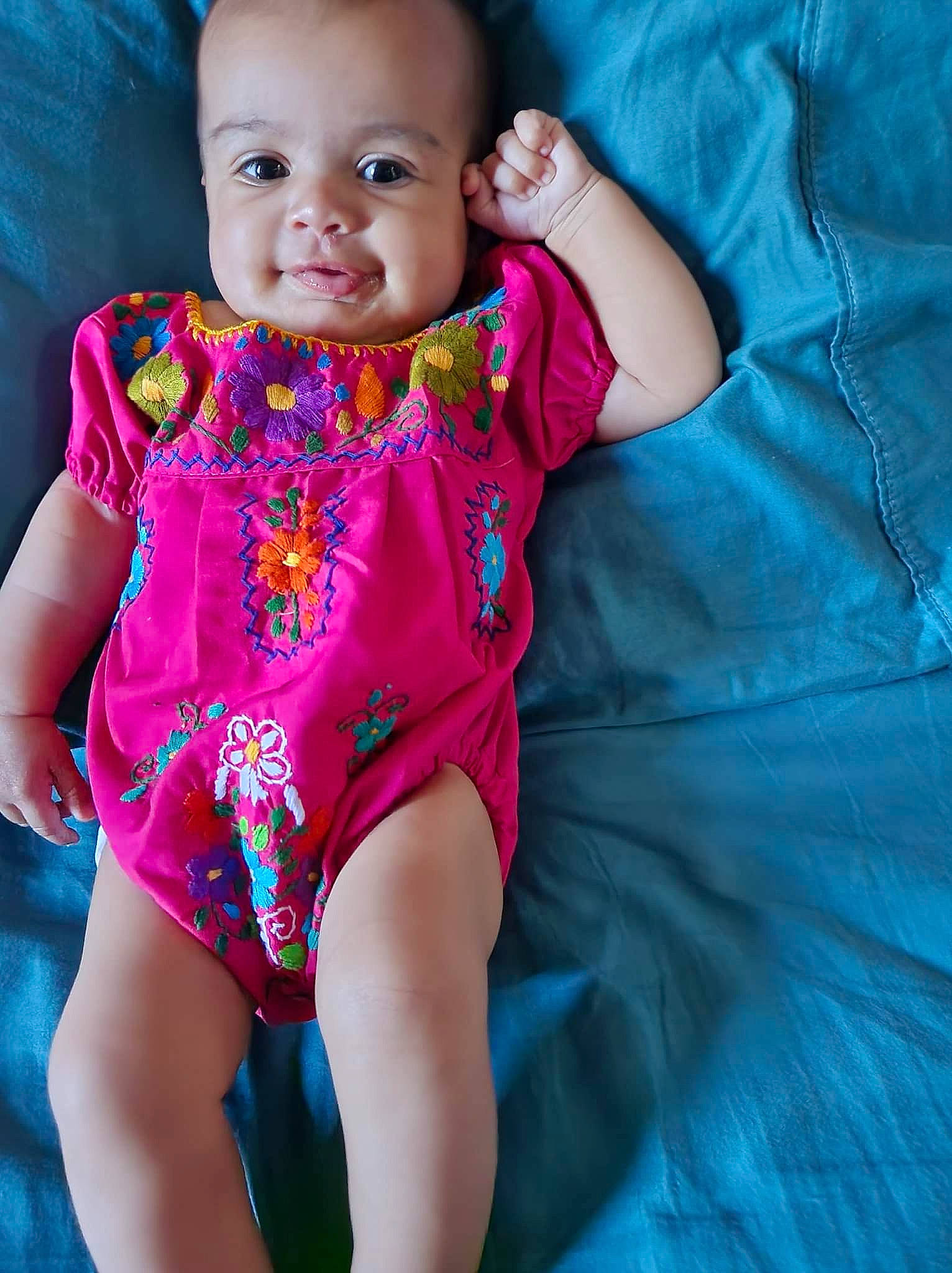 Celina joined the competition — help win amazing prizes! baby, baby_toddler_clothing, blue, cheek, child, eye, face, finger, fun, happy, iris, lip, magenta, mouth, muscle, person, pink, skin, sleeve, thigh