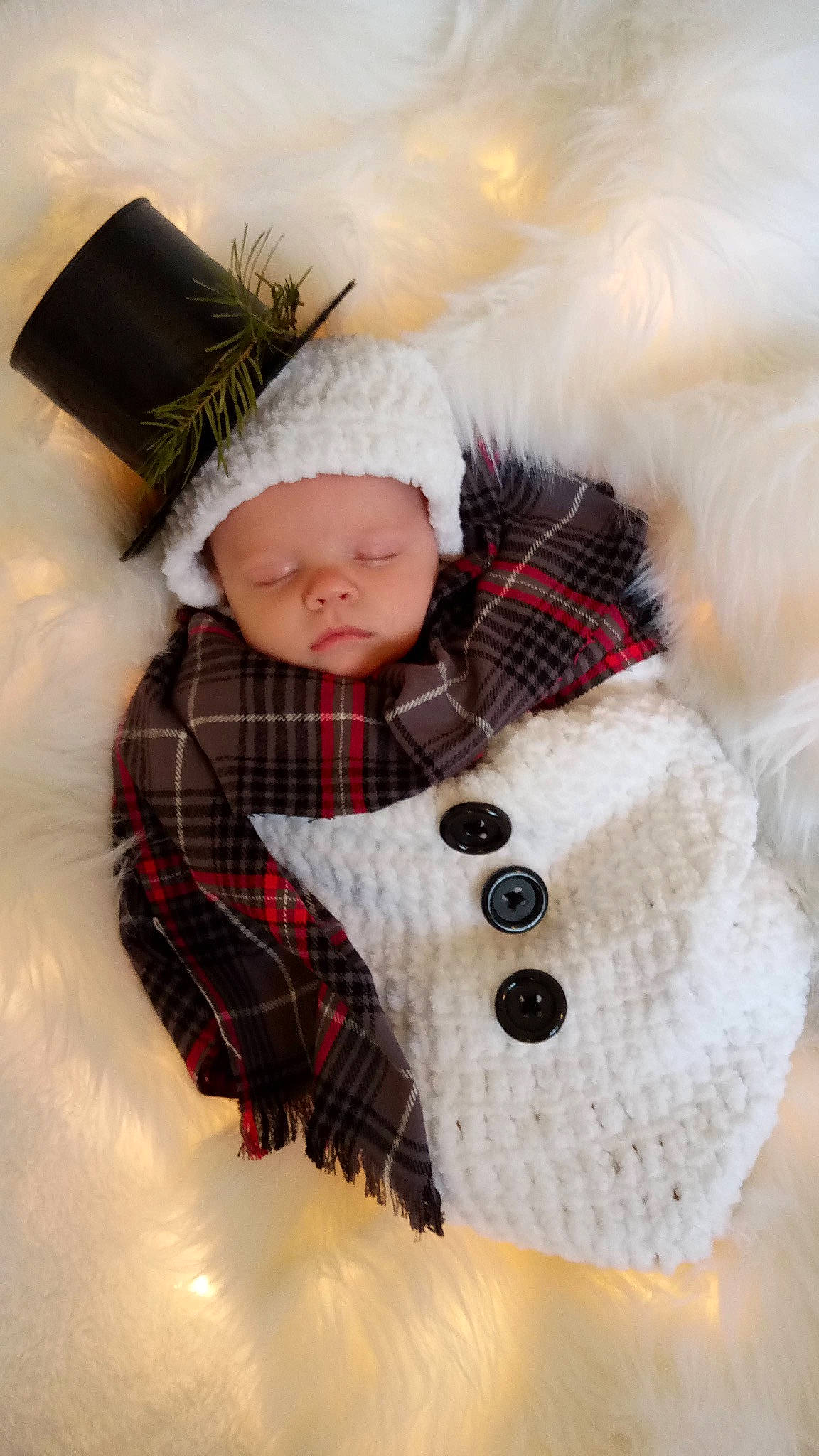 Bryson joined the competition — help win amazing prizes! baby, baby_toddler_clothing, cap, comfort, freezing, headgear, headwear, human_body, knit_cap, mammal, outerwear, pattern, person, plaid, sleeve, snow, tartan, textile, toddler, toy