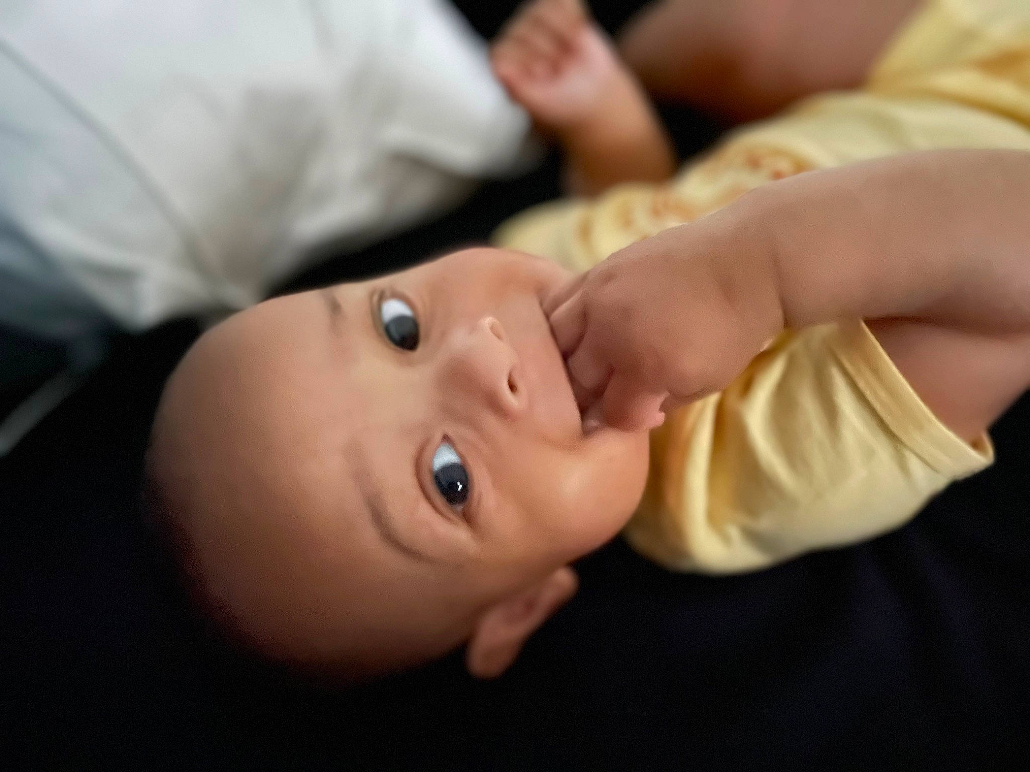 Logan a rejoint le concours — aidez-le/la à gagner de superbes lots ! baby, baby_products, baby_toddler_clothing, cheek, child, eyelash, finger, gesture, hand, happy, lip, nail, neck, nose, person, sleeve, thumb, toddler, wood, wrist