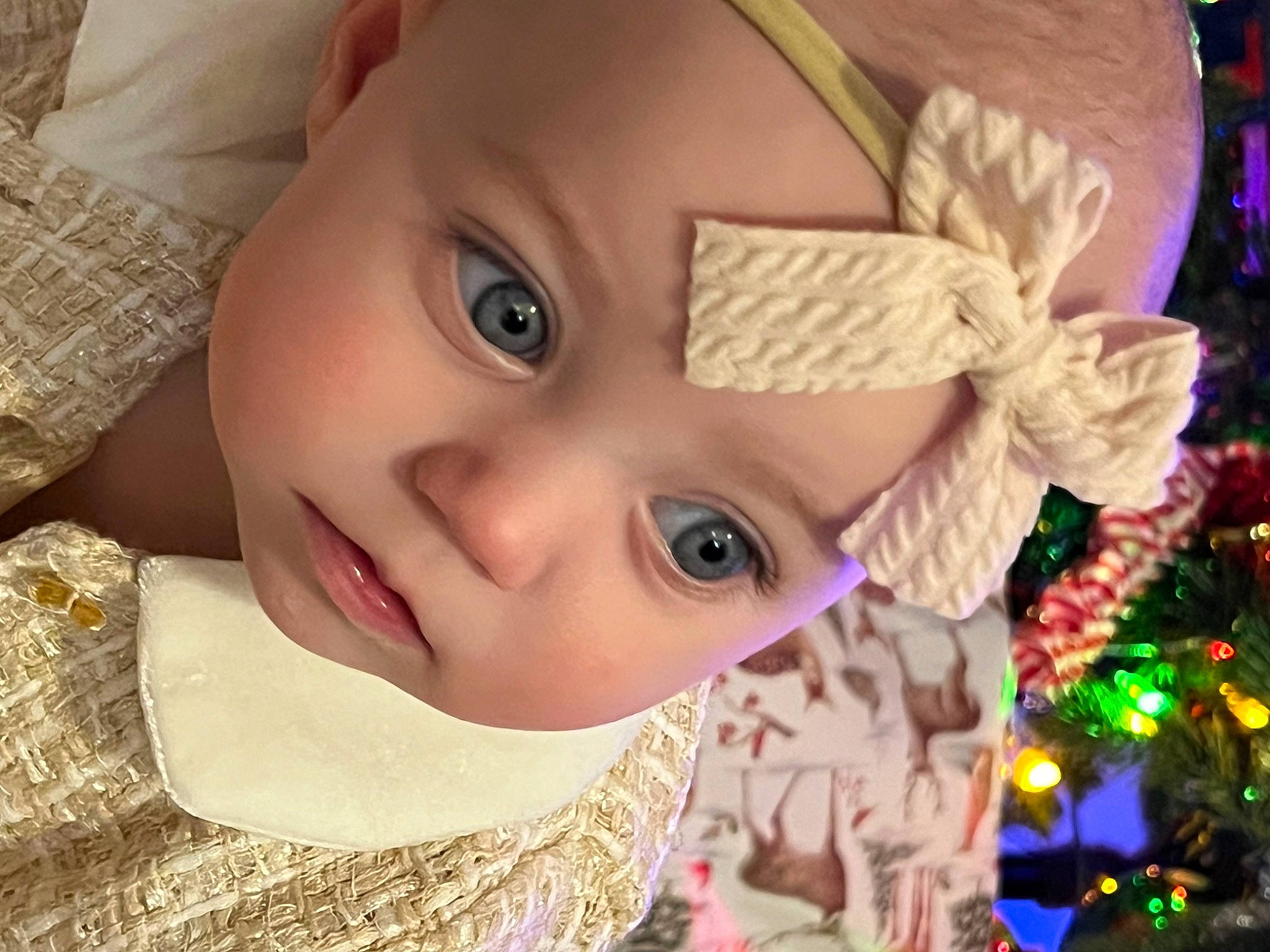 Lakelynn is registered to the contest to win money with this photo: cheek, chin, eye, eyebrow, eyelash, facial_expression, fun, grass, hairstyle, happy, hat, iris, lip, nose, outerwear, person, skin, toddler, tree, window