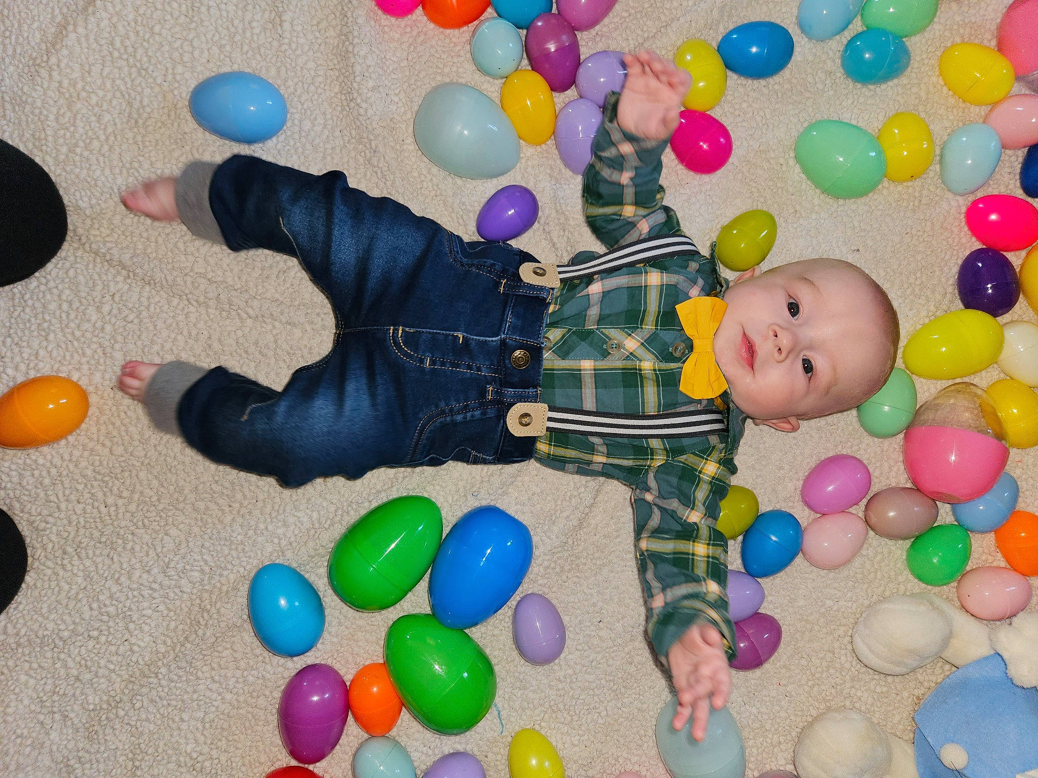 Brandon is registered to the contest to win money with this photo: baby, baby_toys, ball_pit, child, circle, event, fun, mixture, party_supply, pattern, person, plastic, play, sharing, sweetness, toddler, toy