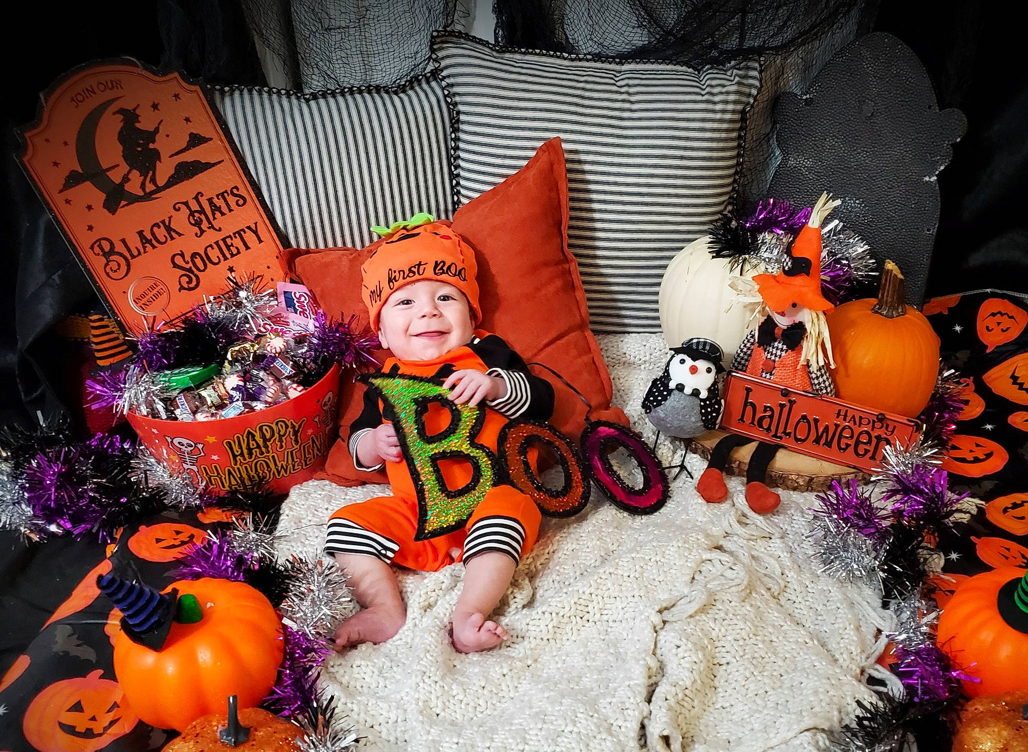 Graysen is registered to the contest to win money with this photo: calabaza, couch, cucurbita, doll, event, gourd, hat, headgear, headwear, joy, orange, person, pillow, pink, plant, plush, pumpkin, room, stuffed_toy, textile