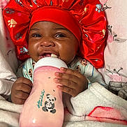 Aviyani joined the competition — help win amazing prizes! baby, bottle, blanket, bonnet, child, clothing, cute, drink, face, feeding, hand, infant, indoors, panda, pink, portrait, sleepwear, smiling, soft, warm