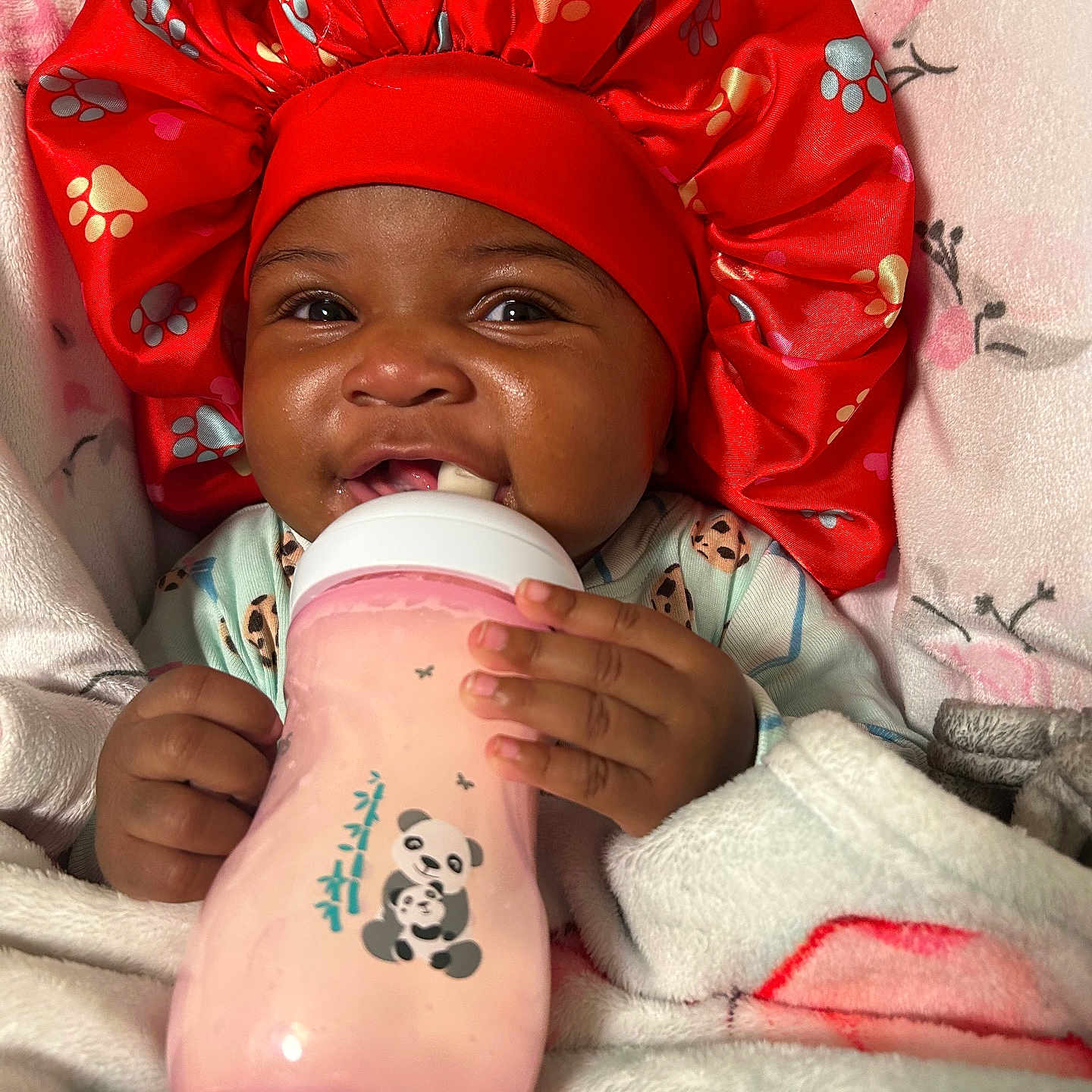 Aviyani joined the competition — help win amazing prizes! baby, blanket, bonnet, bottle, child, clothing, cute, drink, face, feeding, hand, indoors, infant, panda, pink, portrait, sleepwear, smiling, soft, warm