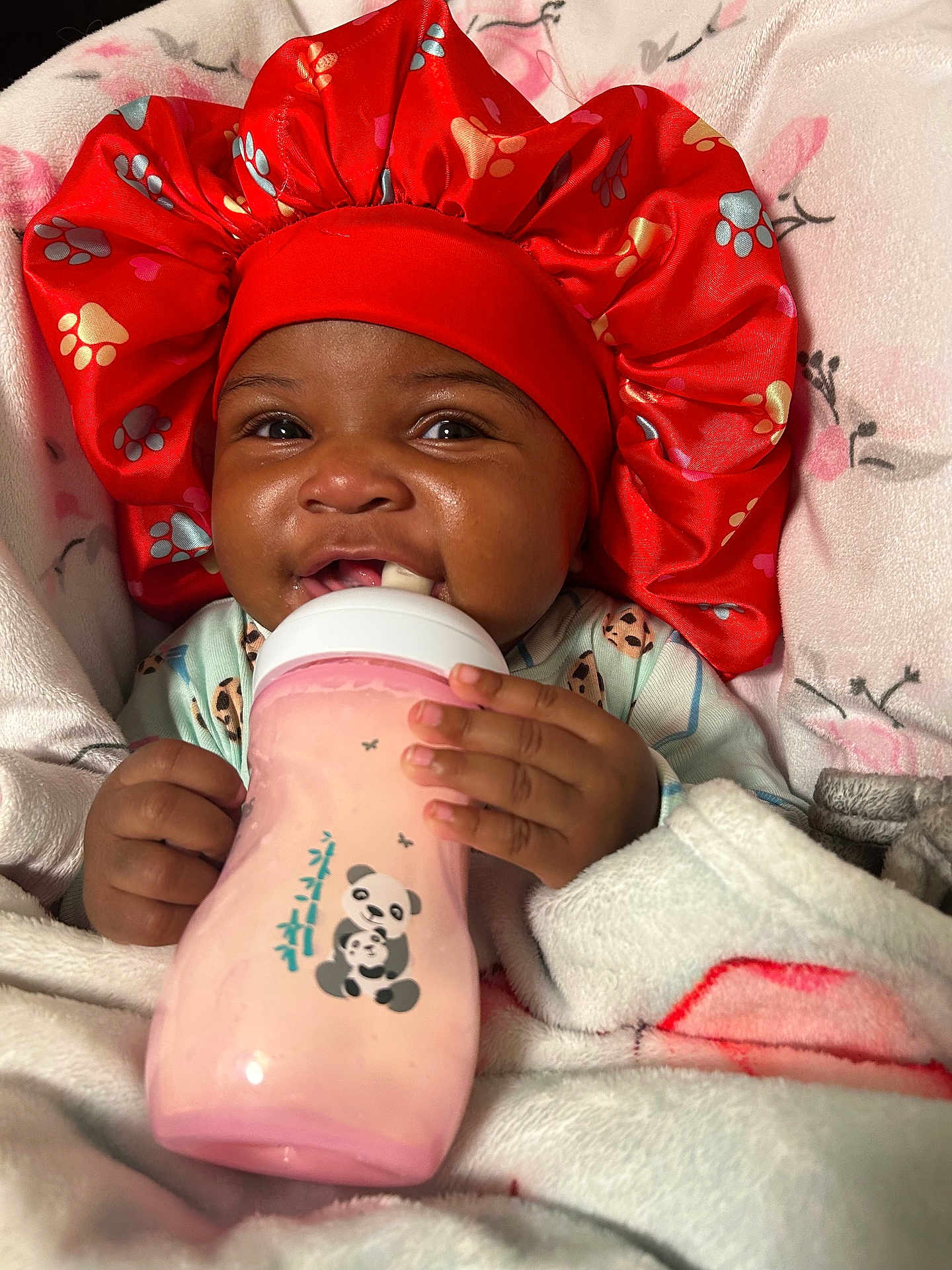 Aviyani joined the competition — help win amazing prizes! baby, bottle, blanket, bonnet, child, clothing, cute, drink, face, feeding, hand, infant, indoors, panda, pink, portrait, sleepwear, smiling, soft, warm