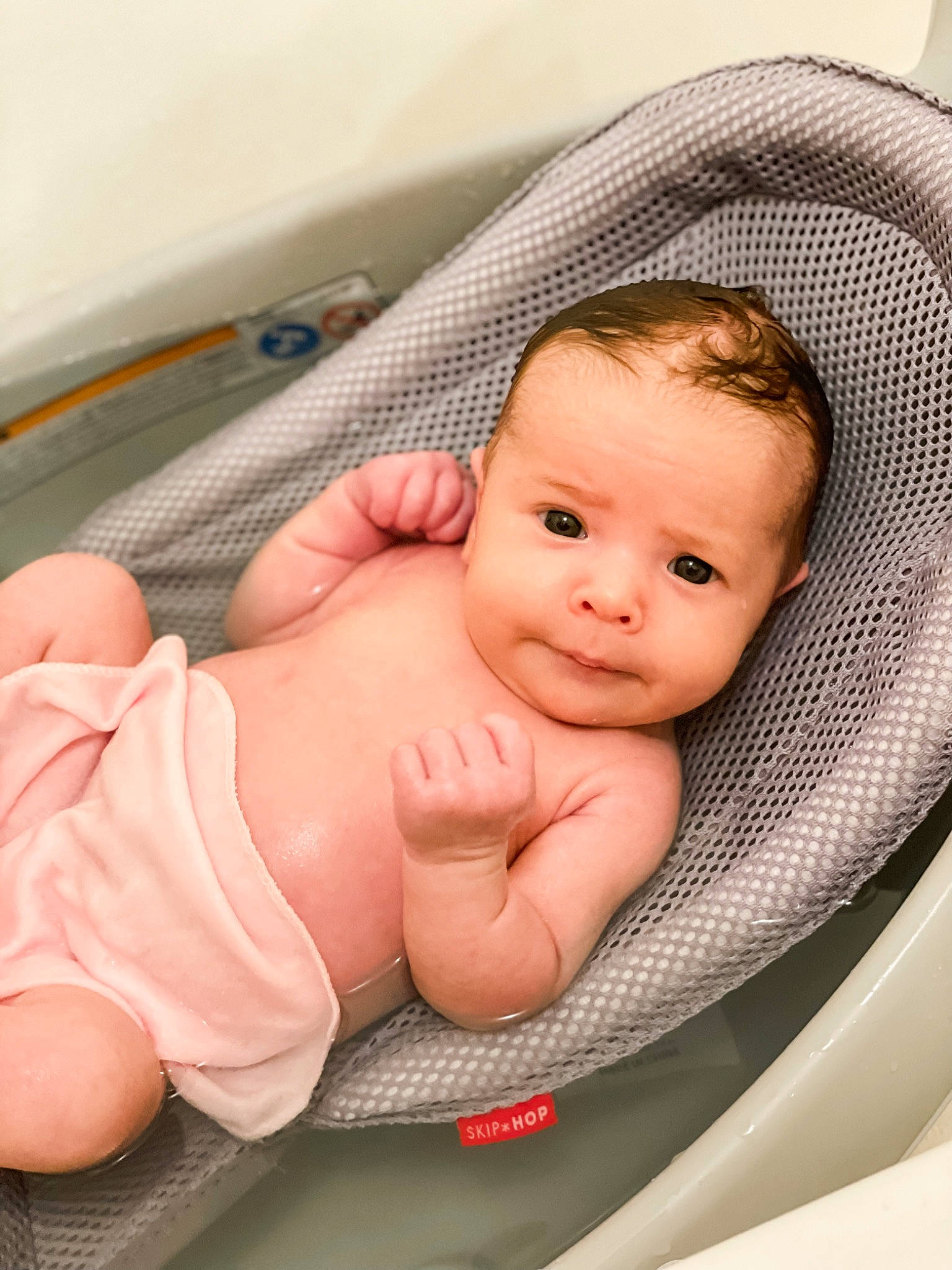 Lily joined the competition — help win amazing prizes! baby, baby_bathing, baby_products, baby_safety, baby_toddler_clothing, barefoot, bathing, cheek, child, comfort, face, foot, head, infant_bed, linens, person, product, skin, stomach, thumb
