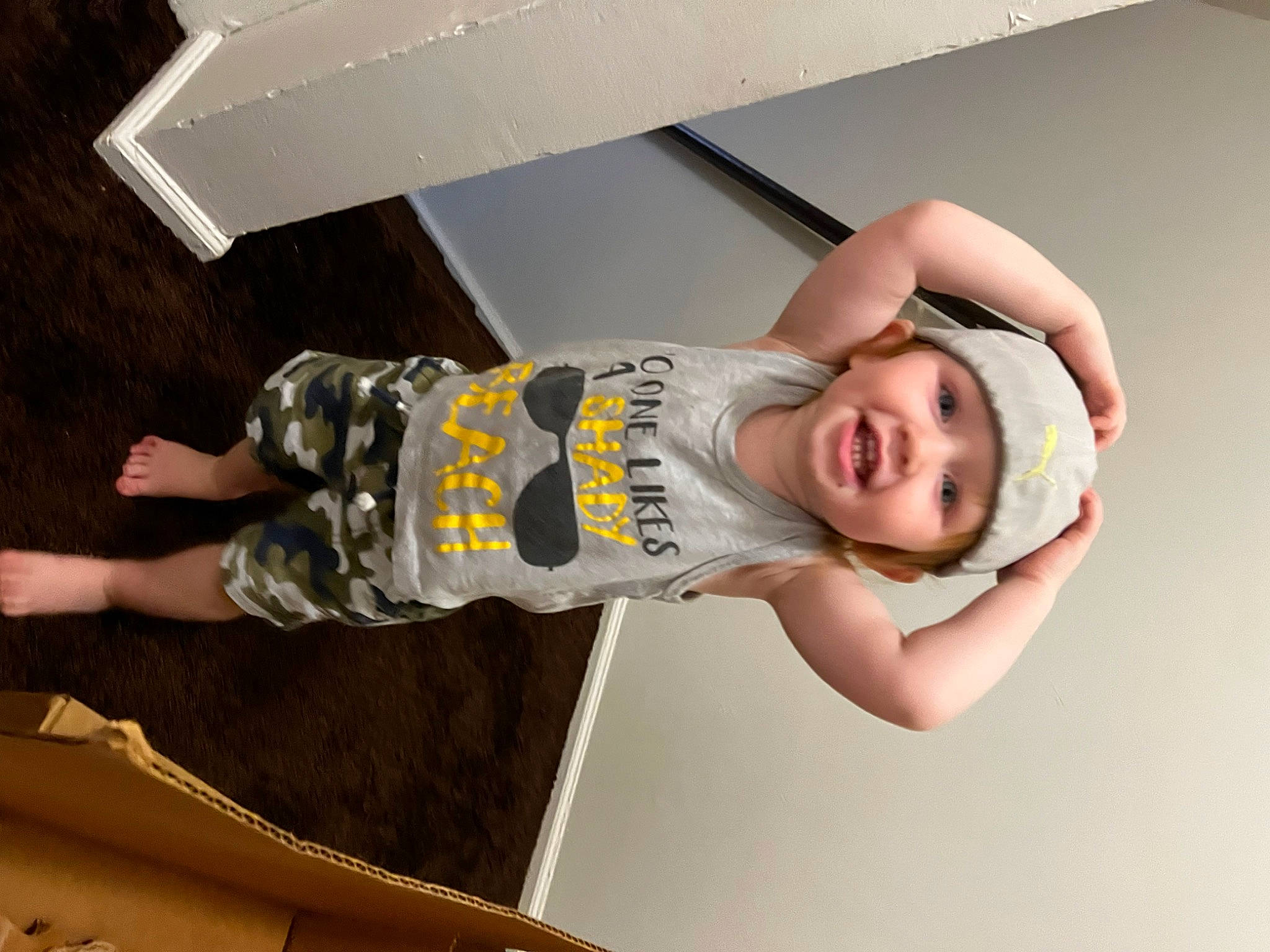 Alan is registered to the contest to win money with this photo: abdomen, child, comfort, elbow, flash_photography, flooring, fun, happy, hardwood, headwear, human_leg, joint, knee, person, room, shoulder, smile, t_shirt, thigh, toddler