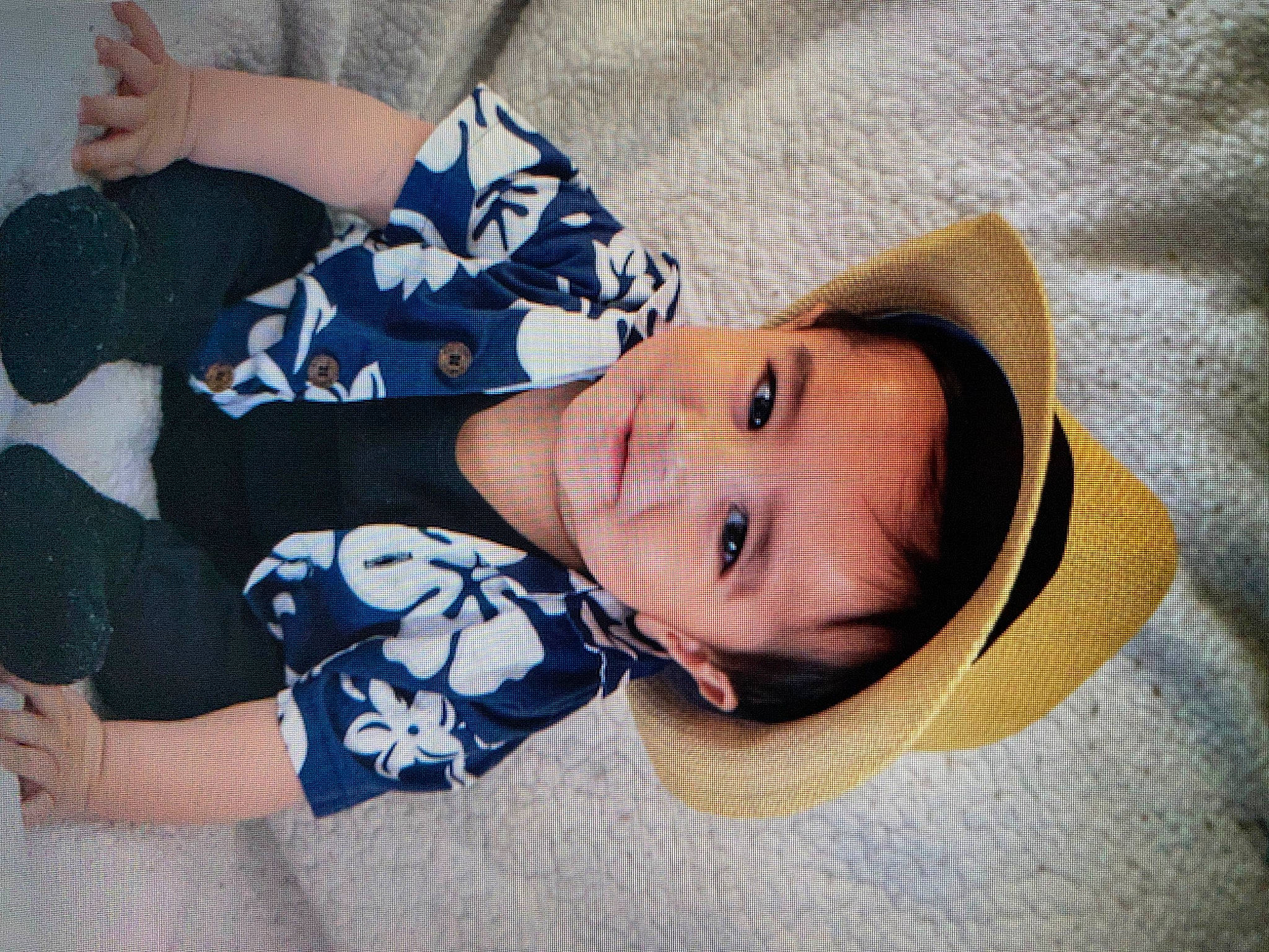 Jiovanni is registered to the contest to win money with this photo: arm, child, comfort, elbow, electric_blue, eye, fashion_accessory, fun, happy, linens, pattern, person, portrait_photography, skin, sleeve, smile, tree, wood