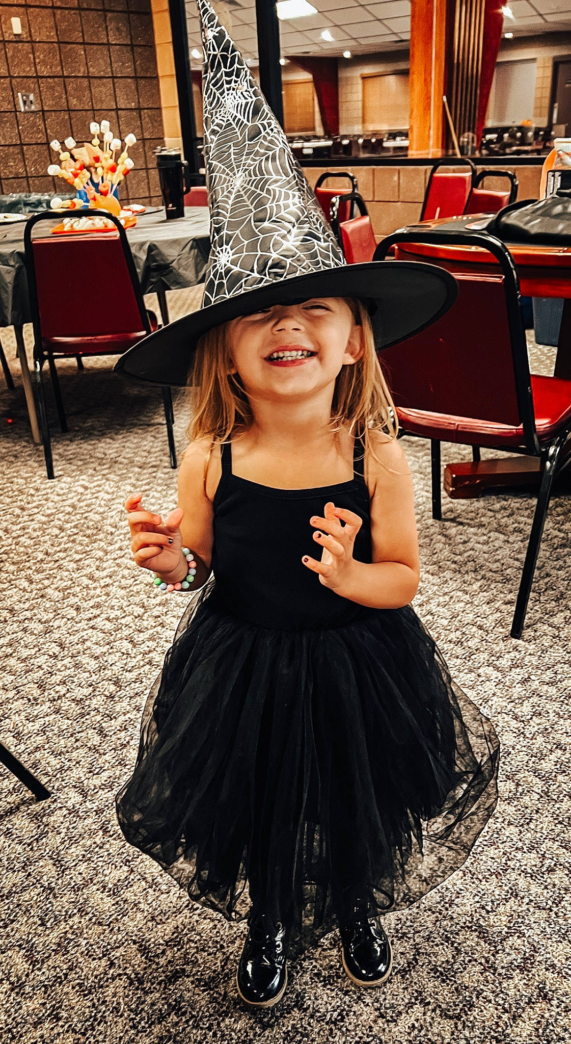 Brooks joined the competition — help win amazing prizes! chair, child, day_dress, dress, event, face, fashion_design, flash_photography, flooring, formal_wear, fun, happy, hat, head, headgear, headwear, joy, leisure, one_piece_garment, person