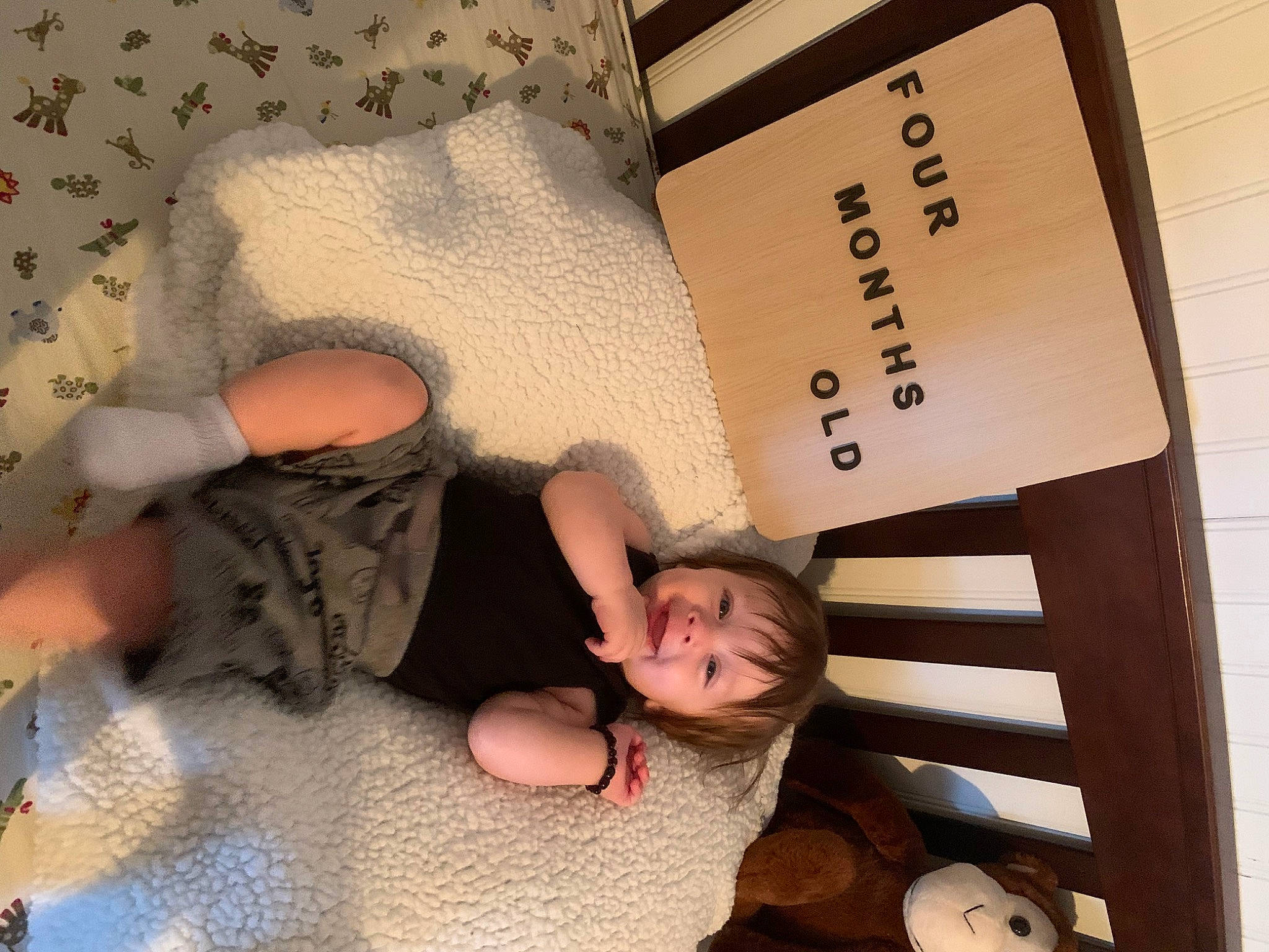 Bodhi joined the competition — help win amazing prizes! baby, baby_toddler_clothing, bed, bedding, bedroom, child, comfort, finger, flooring, font, happy, human, linens, mammal, person, product, room, skin, textile, toddler