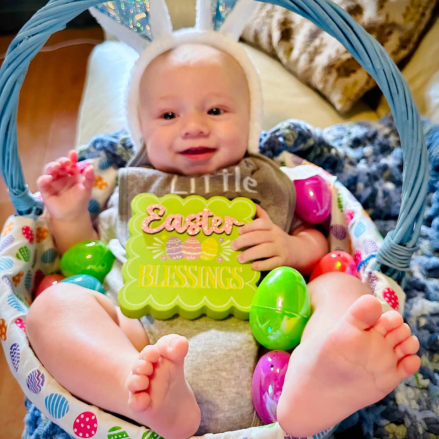 Bobby joined the competition — help win amazing prizes! baby, basket, bed, crib, cushion, diaper, face, furniture, head, homedecor, infantbed, newborn, people, person, photography, portrait, purple, quilt, sitting, toy